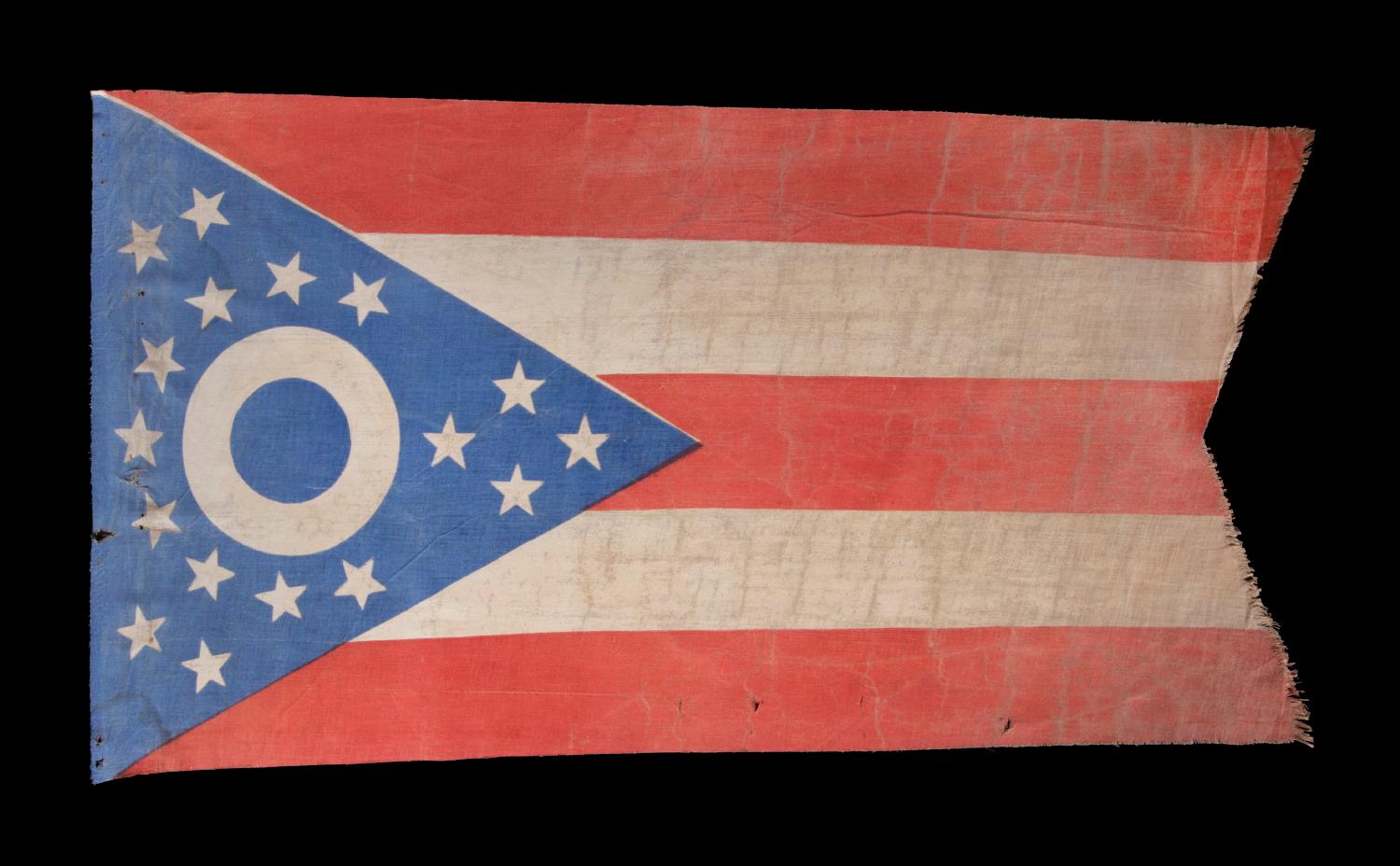 Early Ohio state flag with a blue disc inside the buckeye, circa 1902-1915, an extremely rare and beautiful example:

Early state flags fall between very scarce and extraordinarily rare in the antiques marketplace. One primary reason for this is