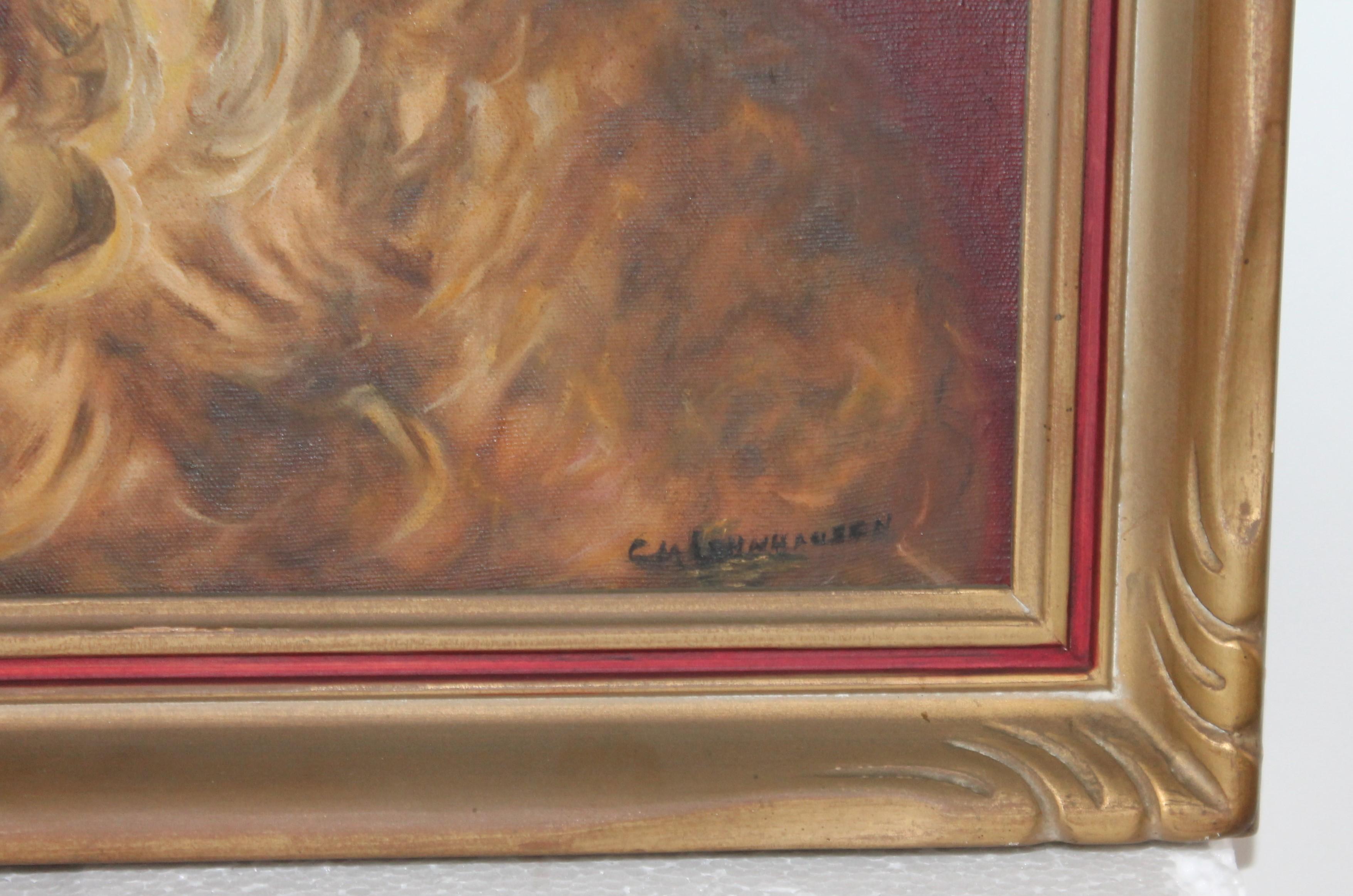 This fine hand painted oil painting of a dog in the original painted and gilded frame is in amazing as found condition. The back side has the original photograph of the owners with the dog in the picture.