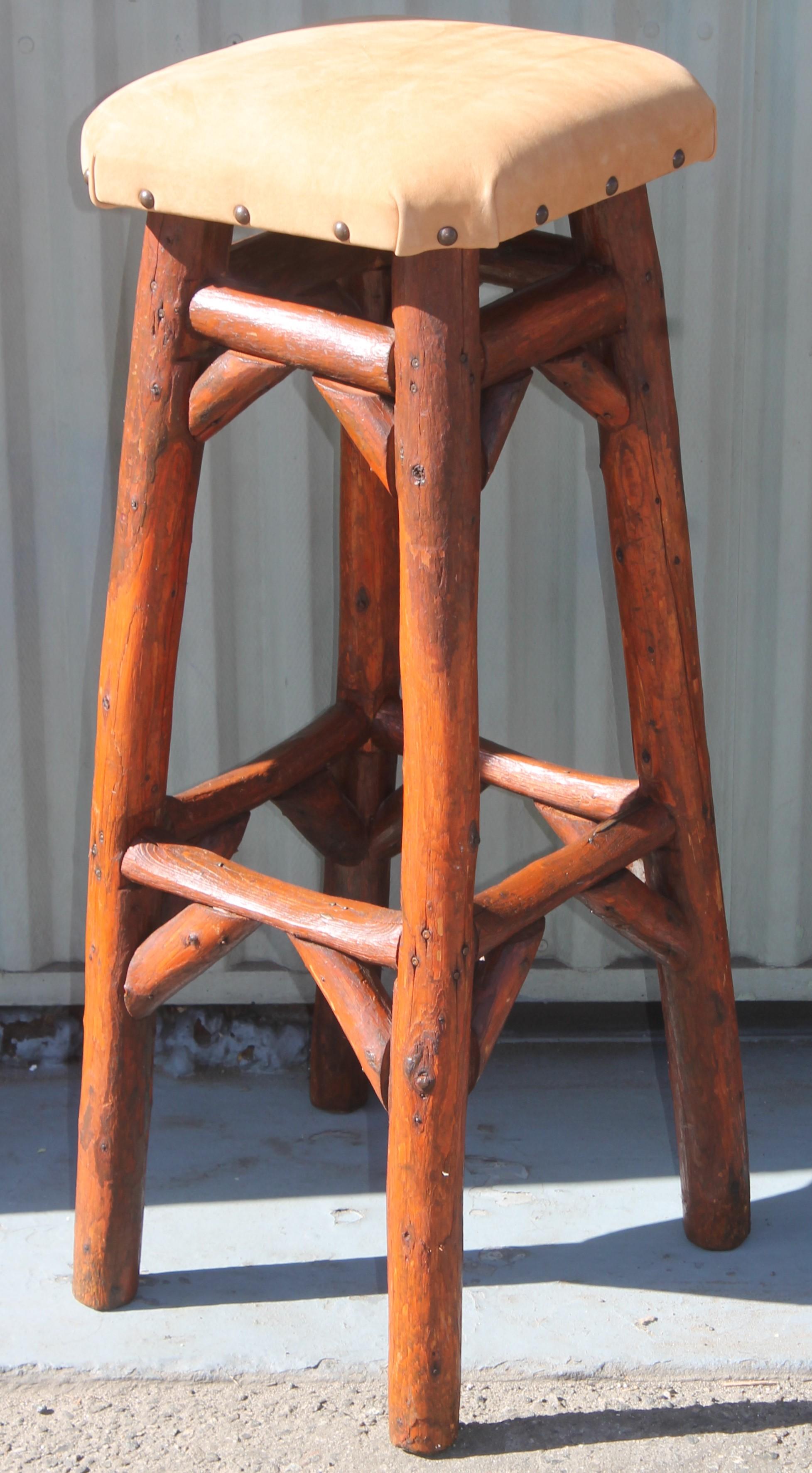 Amazing Signed Old Hickory Furniture bar stools from Martinsville,Indiana and newly re-upholstered in sued leather seats.These sturdy & strong bar stools or counter stools are super comfortable.Sold as a matched pair.