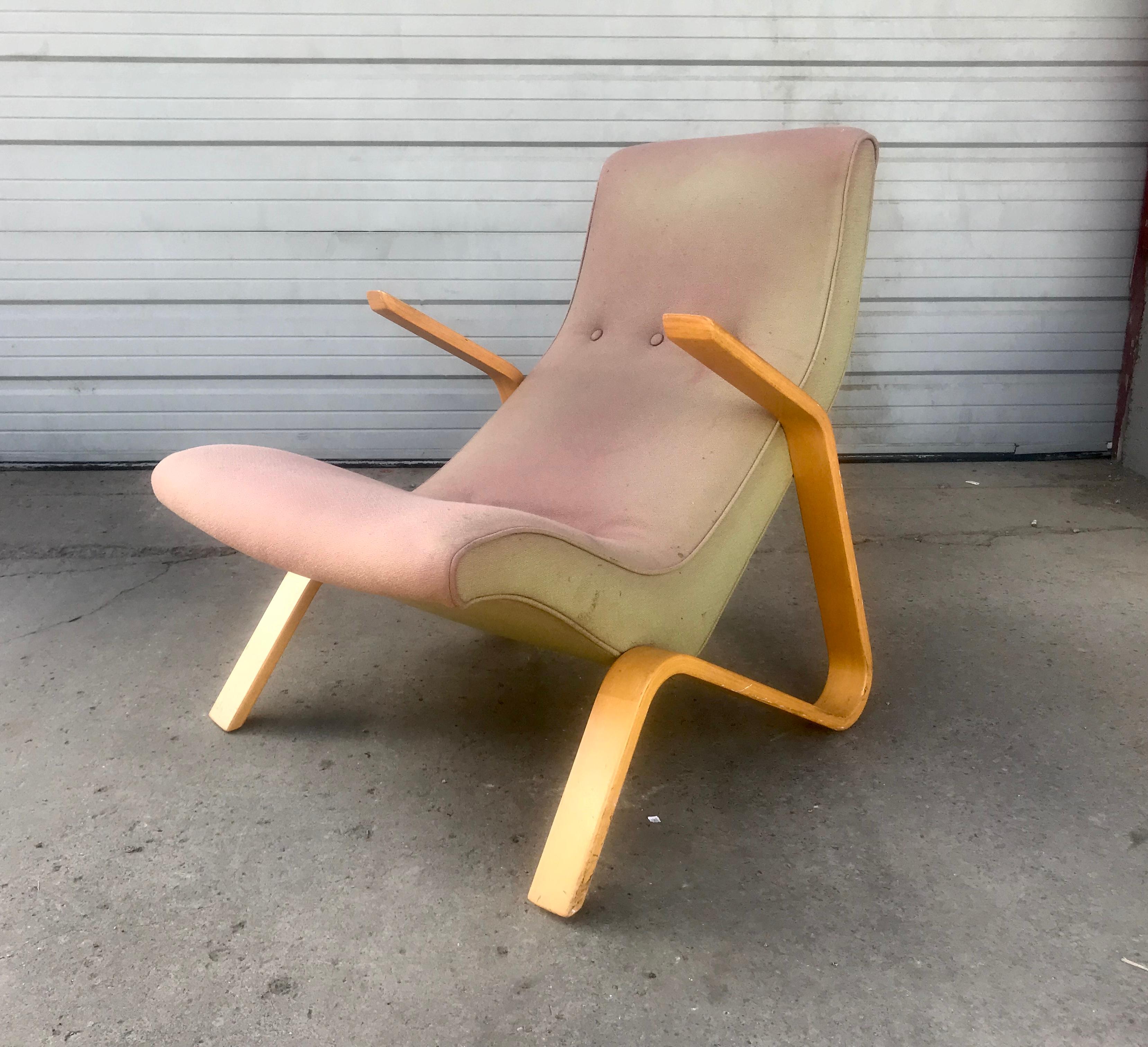 Original Saarinen grasshopper lounge chair manufactured by Knoll, chair retains original wool fabric upholstery, Usable but faded,,
At Cranbrook, Saarinen also met Florence Schust Knoll, who, as director of her husband Hans Knoll's eponymous