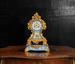 Early Ormolu and Porcelain Antique French Clock by Raingo Freres