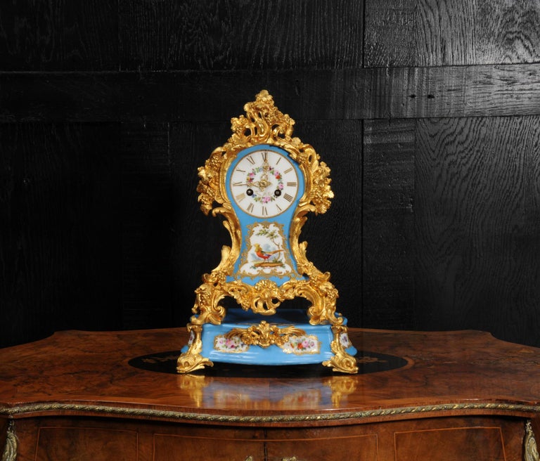 ~ French - Circa 1840 ~

~~ Excellent condition, fully overhauled ~~

A fine and early Louis XV style porcelain antique French clock mounted with exquisite ormolu (mercury fire gilded bronze doré). It is by the famous Parisian maker Raingo Frères.