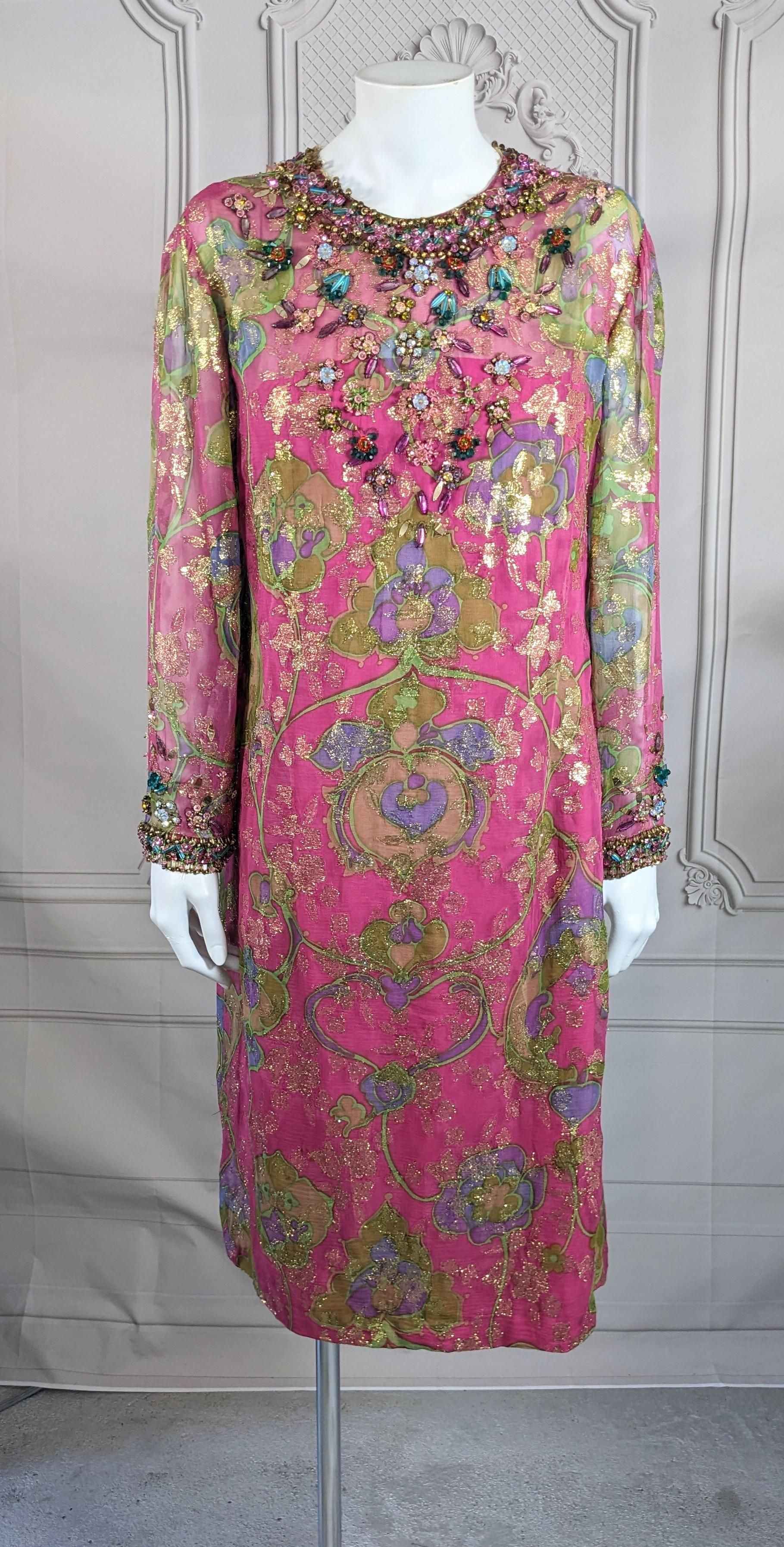 Early Oscar de la Renta Beaded Sheath with bohemian vibes from the 1960's. Silk chiffon Art Nouveau print shot with gold lurex. Colorful bead work at neckline and wrists. Lined with pink crepe from bust down and sheer elsewhere. Simple straight cut.