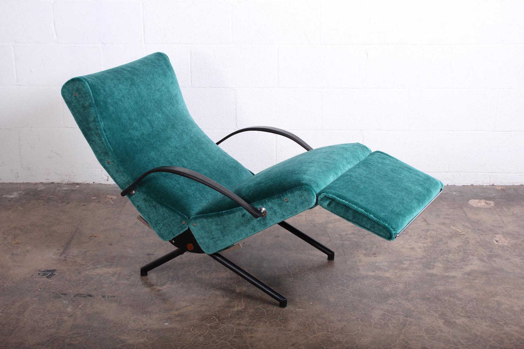 Early lounge chair model P40 designed by Osvaldo Borsani for Tecno. The P40 armchair can be adjusted into countless positions. The seat, back and footrest can all be adjusted separately from each other. Reupholstered in a thick mohair.