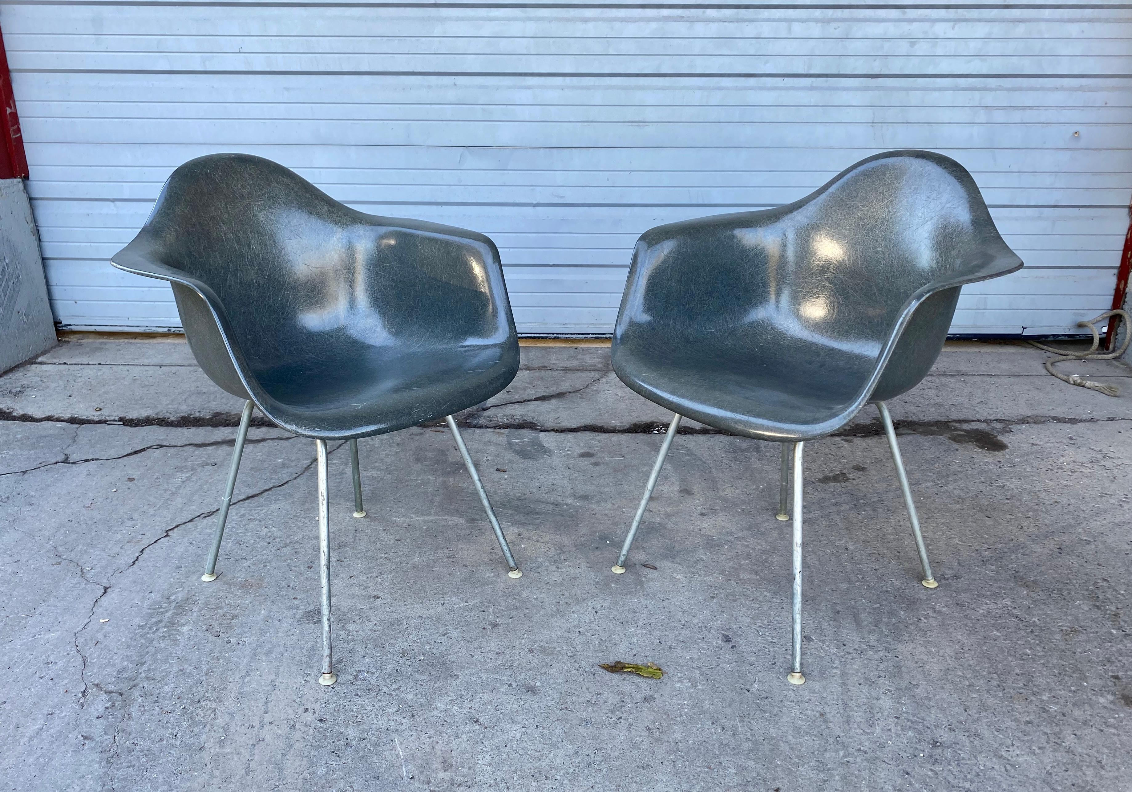 Early Pair of Charles Eames Fiberglass Arm Shell Chairs 