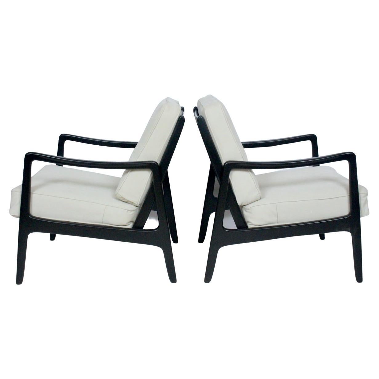Early Pair of Ole Wanscher Ebonized Mahogany Lounge Chairs, 1950's
