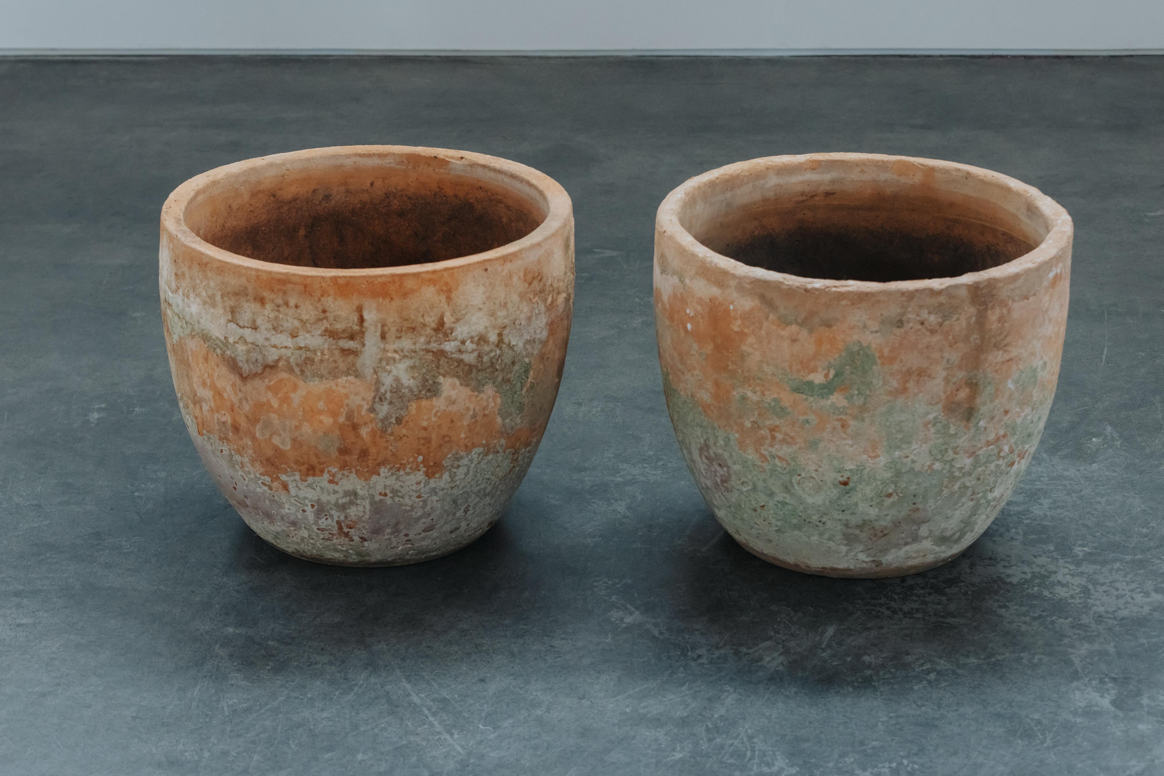 Early Pair Of Terracotta Urns From France, Circa 1920.  Nice pair with fantastic patina.