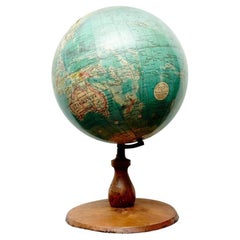 Early Paluzuie Globe with Rotating Wood Base, circa 1930