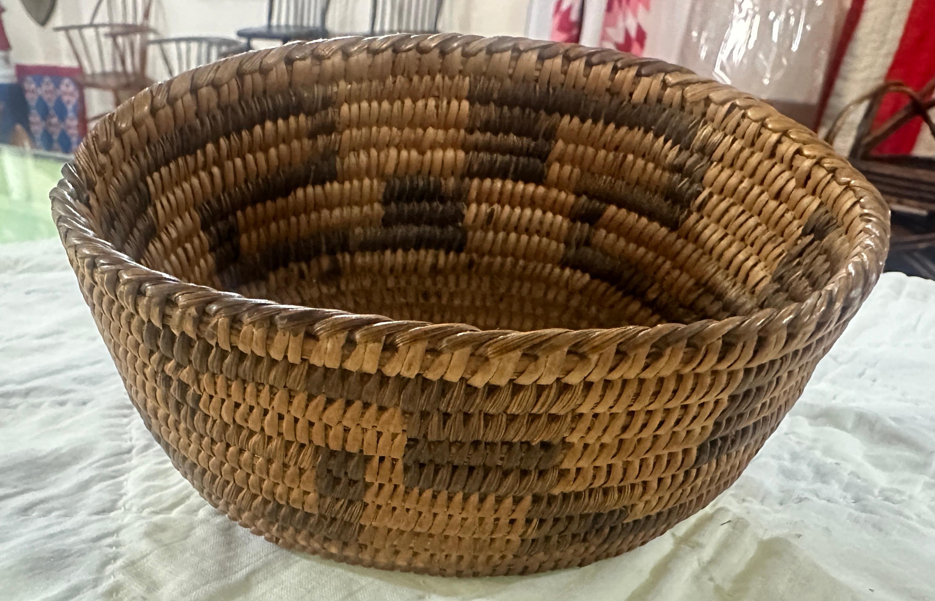 This early 20thc Papaggo Indian basket is in fine as found condition.The size is sweet and nice aged patina.