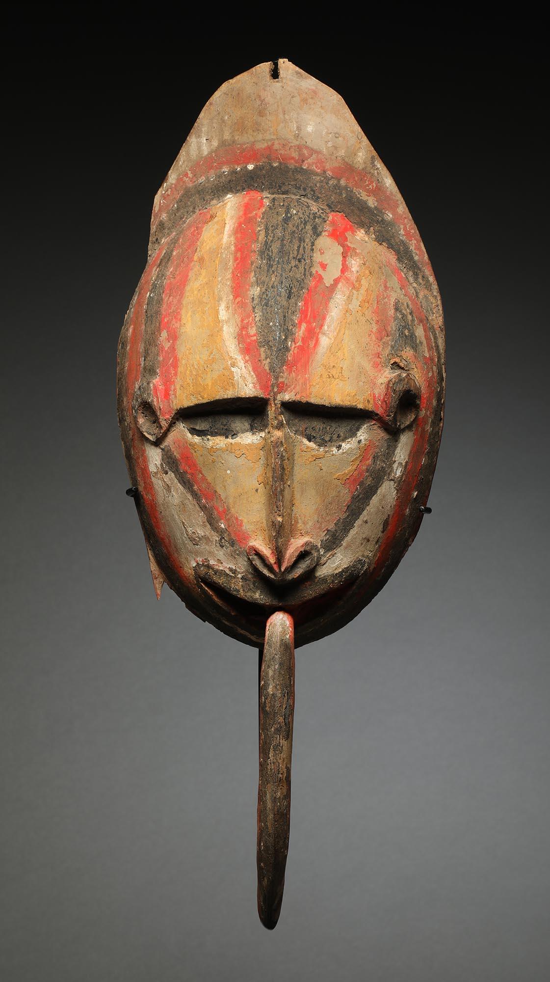 Papua New Guinean Early Papua New Guinea Painted Maprik Wood Mask Long Tongue Ex M. Hamson For Sale