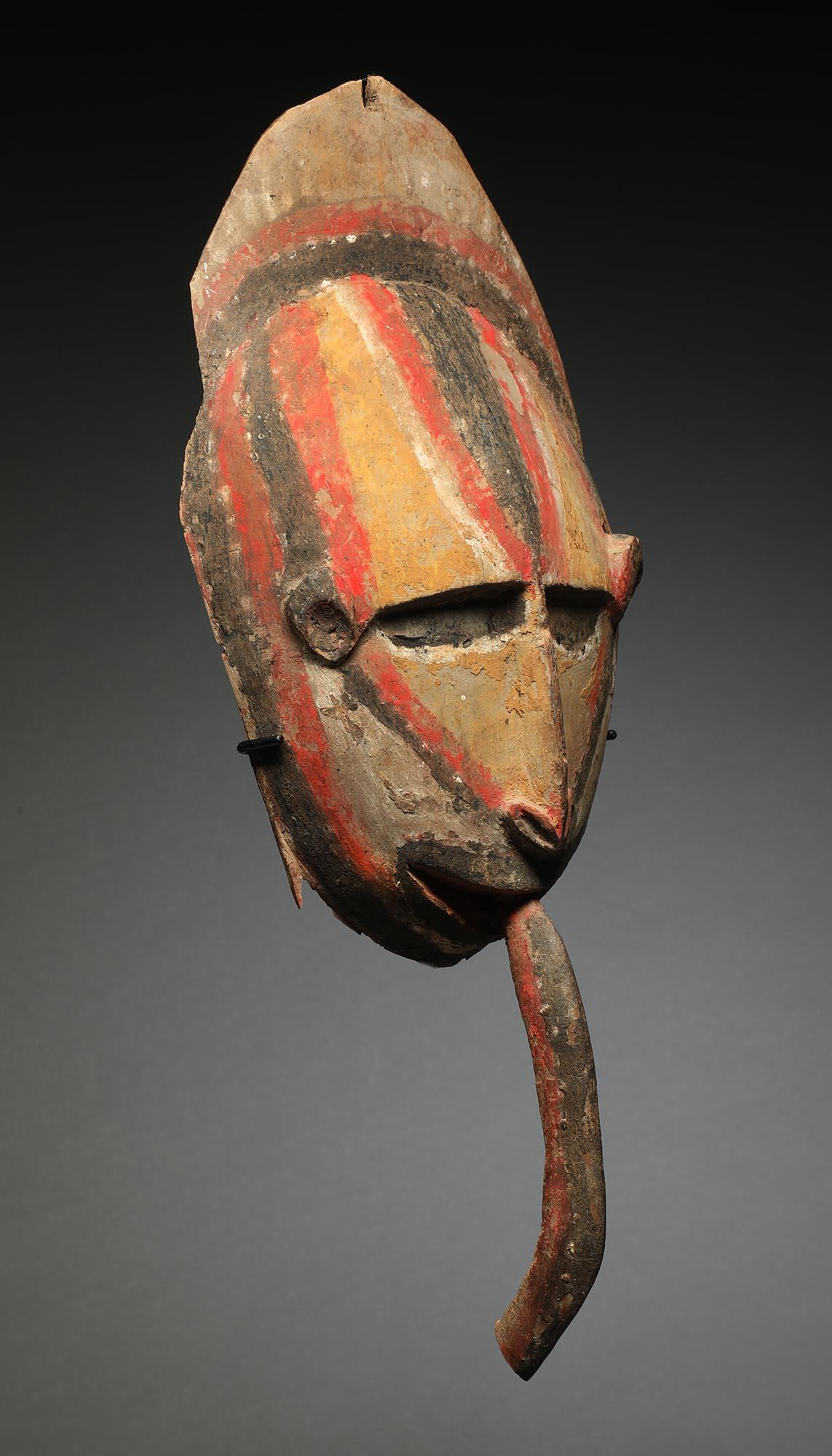 Hand-Crafted Early Papua New Guinea Painted Maprik Wood Mask Long Tongue Ex M. Hamson For Sale