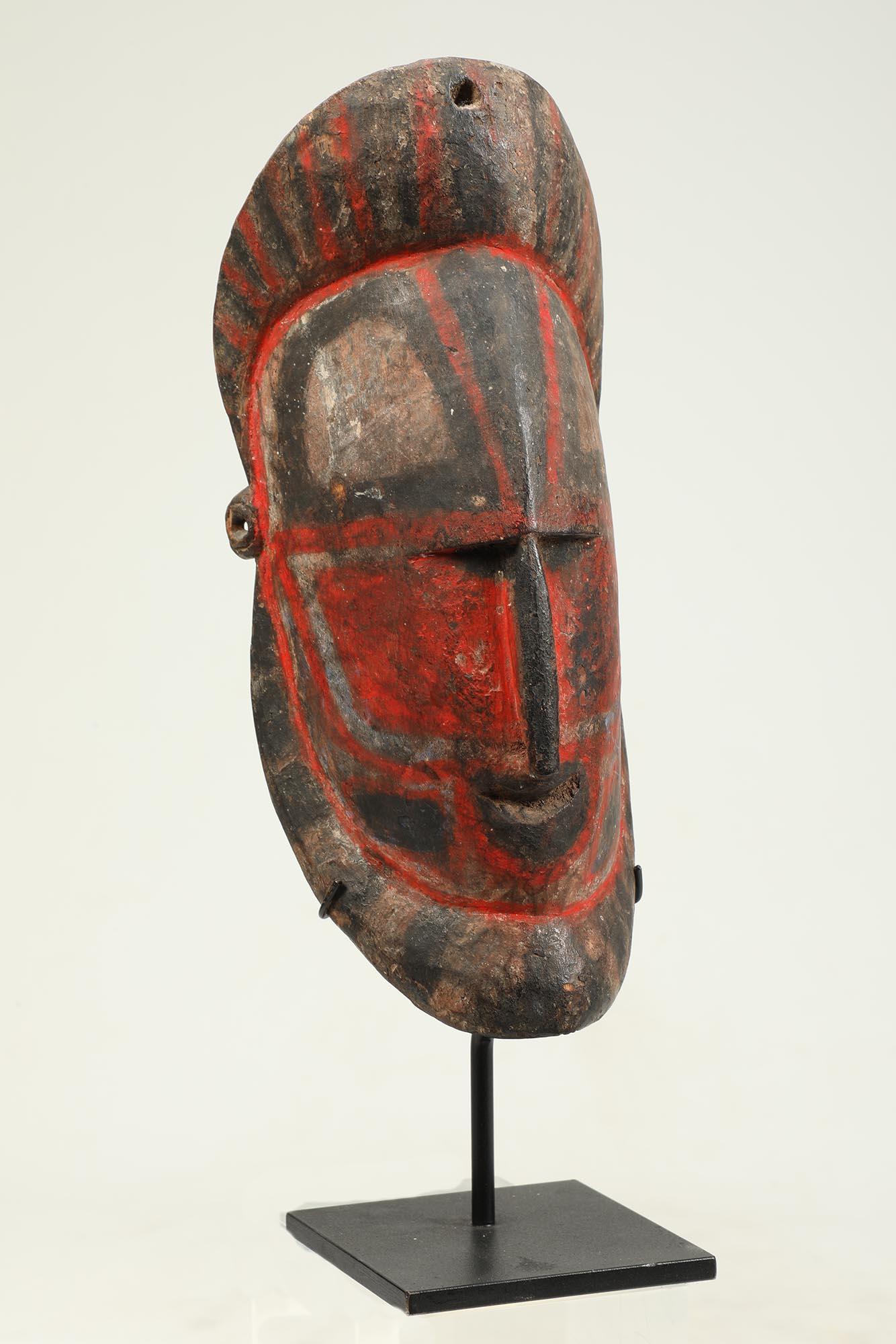 Papua New Guinean Early Papua New Guinea Sepik Hard Wood Yam Mask Red and Black For Sale