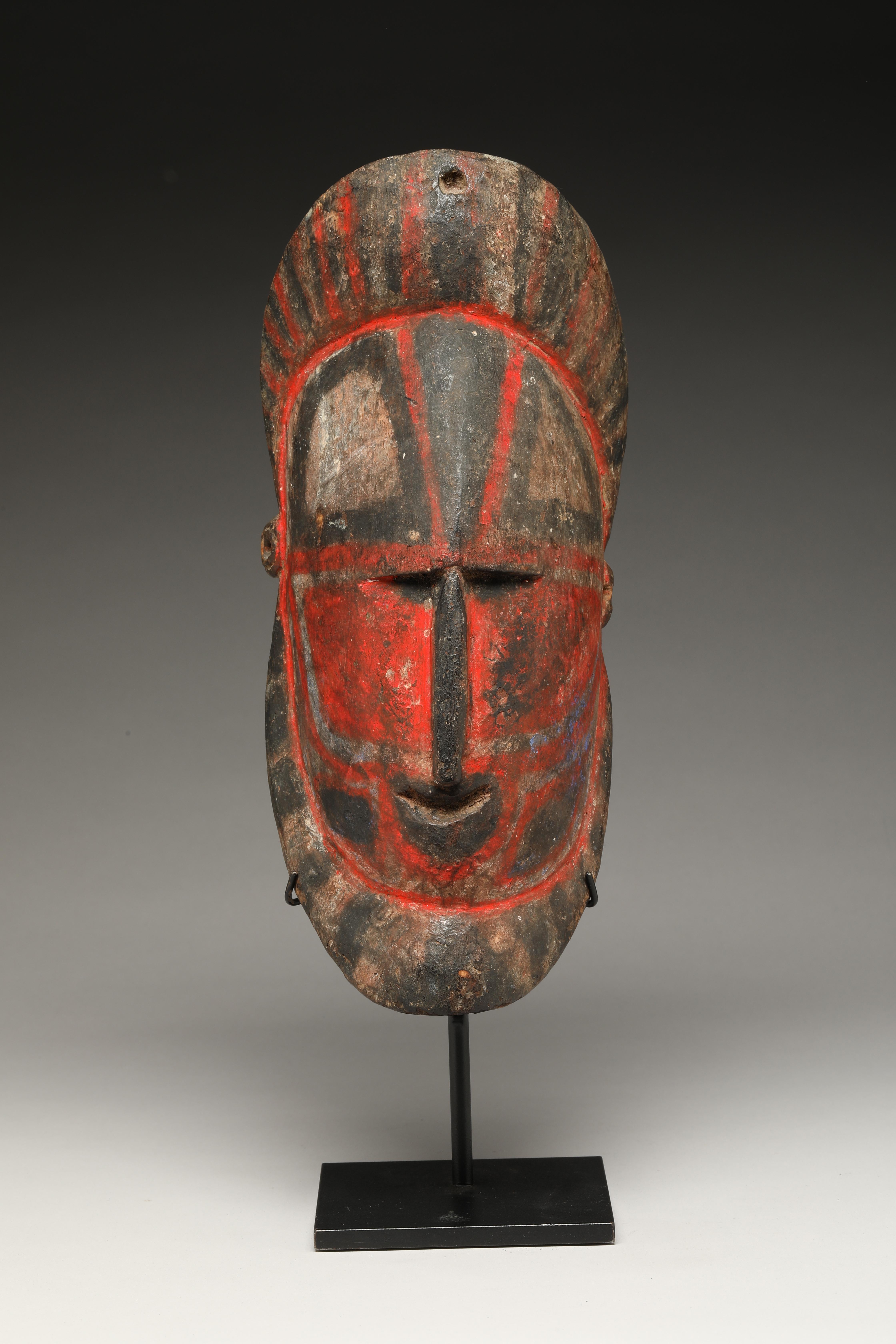Hand-Crafted Early Papua New Guinea Sepik Hard Wood Yam Mask Red and Black For Sale