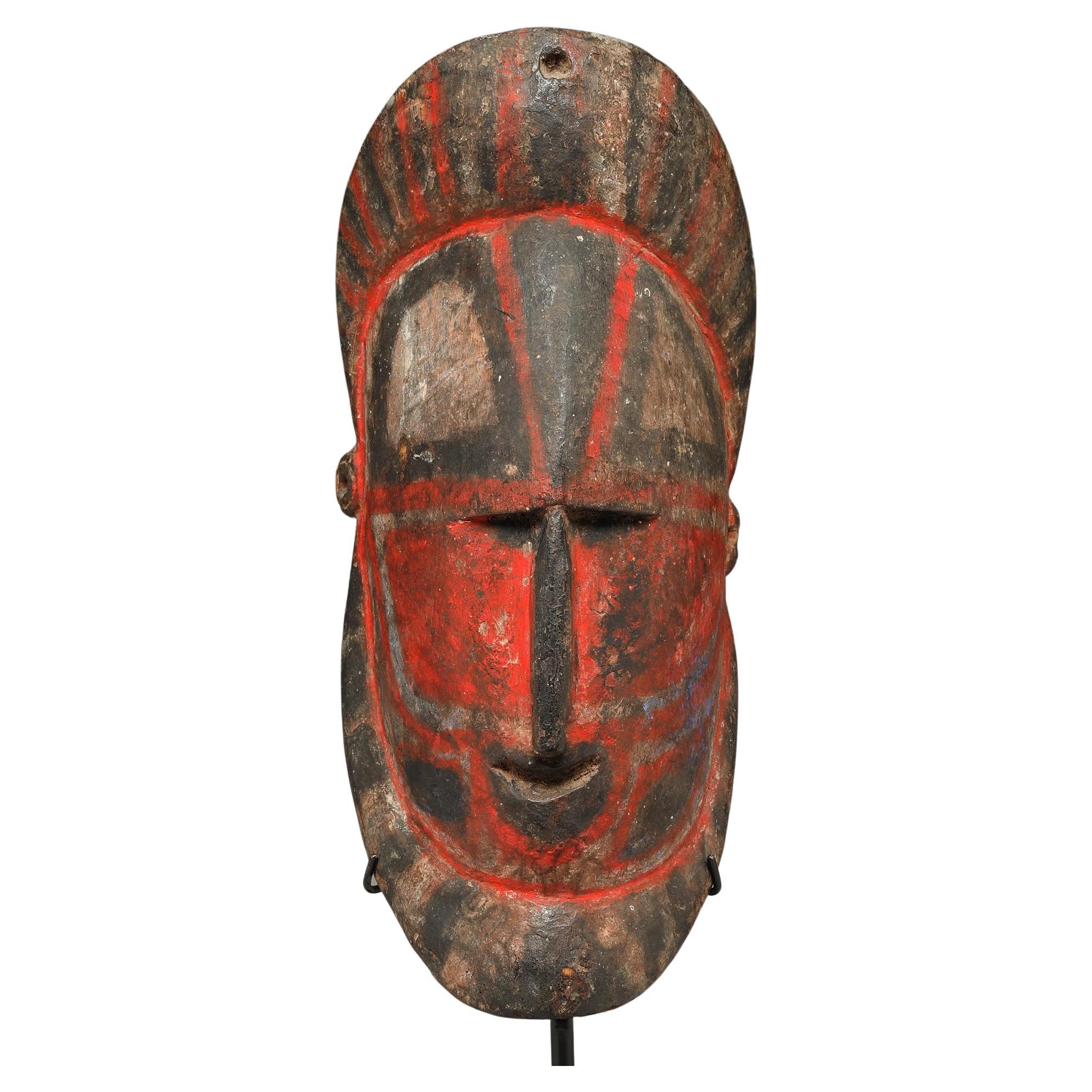 Early Papua New Guinea Sepik Hard Wood Yam Mask Red and Black For Sale