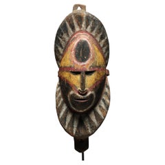 Vintage Early Papua New Guinea Sepik Wood Yam Mask Yellow Red and Black on Custom Base