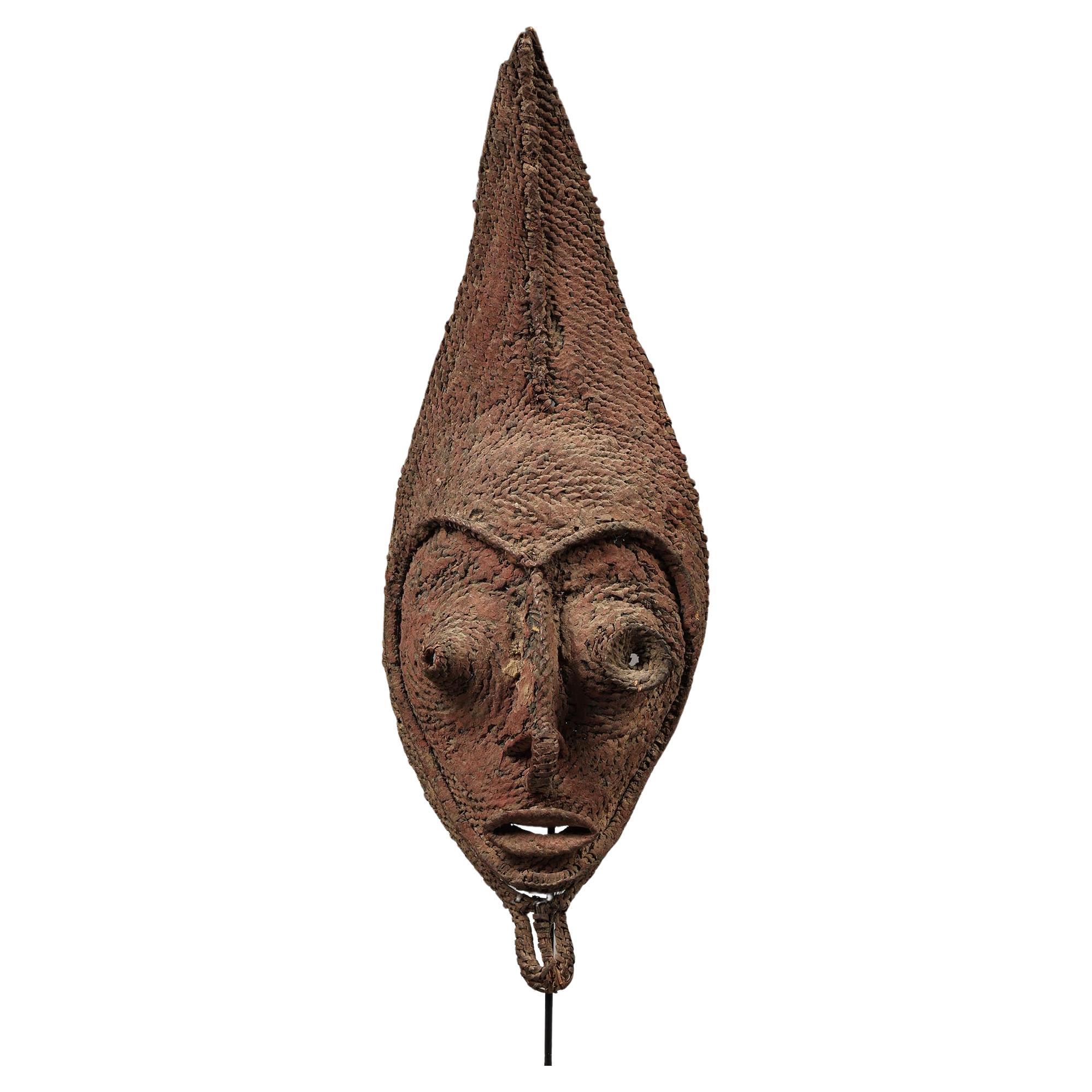 Early Papua New Guinea Sepik Woven Raffia Talipun Mask Red Pigments ex Hamson For Sale