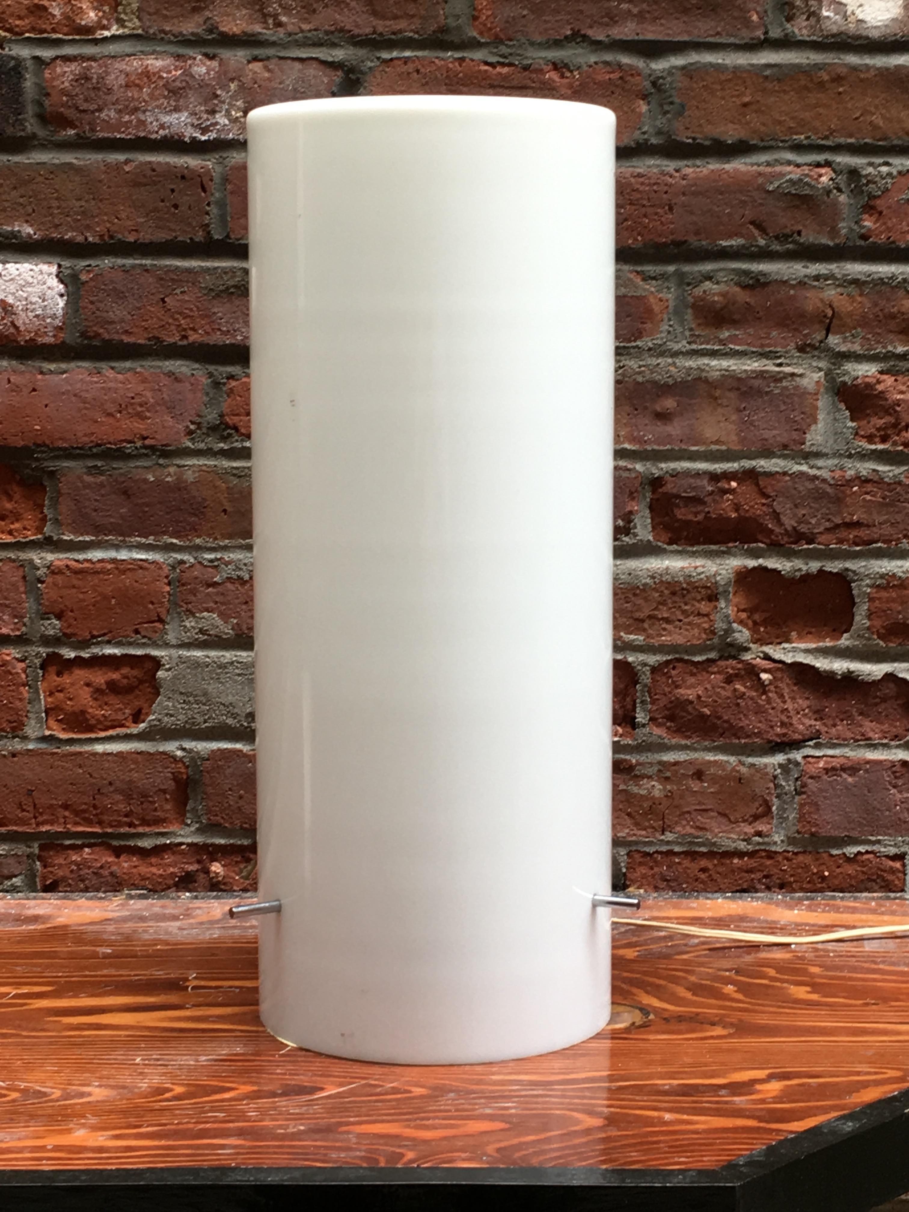Early white cylindrical hand blown cased glass with chrome fittings. Designed by Paul Mayen and for Habitat. An early glass example before it was switched over to white Lucite or Lumacryl, circa 1960. The single bulb fixture throws off a warm,