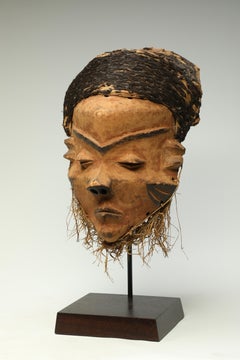 Early Pende Giwoyo Mask with Strong Face and Woven Black Raffia Hair Cap