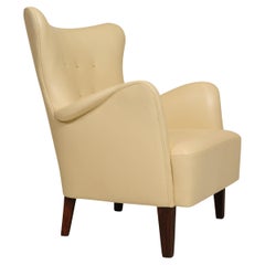 Early Peter Hvidt Lounge Chair in Light Yellow Cream Leather