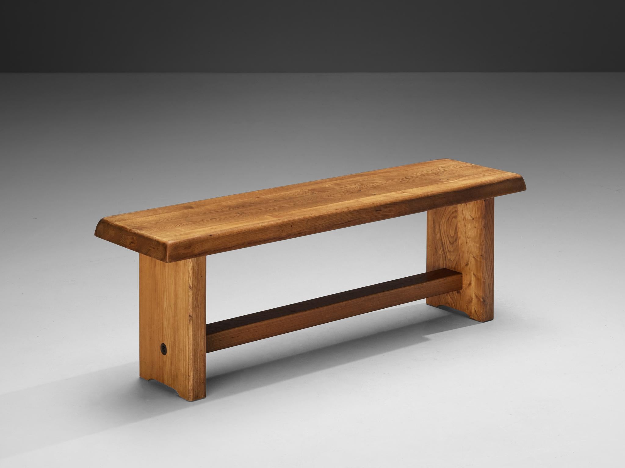 Pierre Chapo, bench, model 'S14A', solid elm, France, circa 1960

The elm bench is an exquisite creation designed by the renowned French designer, Pierre Chapo. Its rectangular top showcases gently sloping edges, gracefully supported by a
