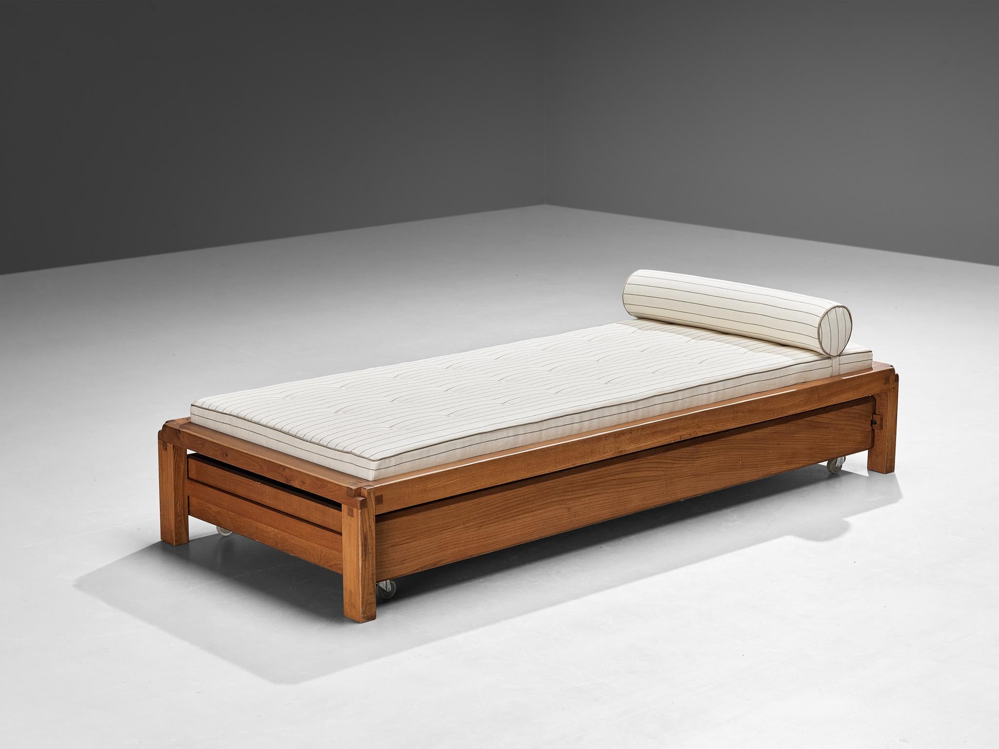 Pierre Chapo, daybed with drawer model 'L03', France, circa 1965. 

This design is an early edition, created according to the original craft methodology of Pierre Chapo. The bed has storage underneath in the shape of a large drawer with wheels. The