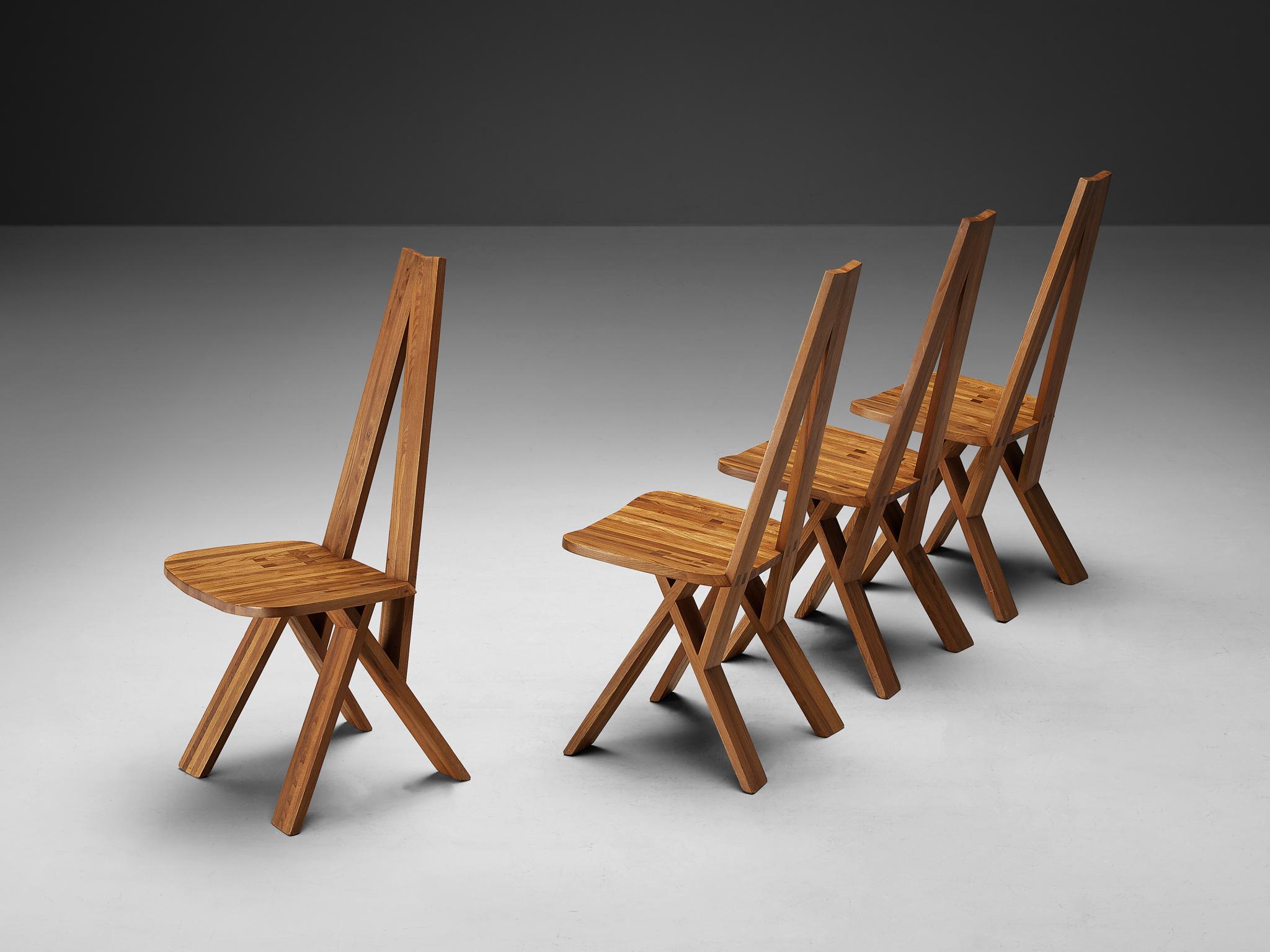 Pierre Chapo, set of four 'S45' or 'Chlacc' dining chairs, solid elm, France, 1979

These S45 chairs, also known as Chlacc, are one of the early editions designed by Pierre Chapo, known for his hallmark use of solid elmwood and a commitment to pure