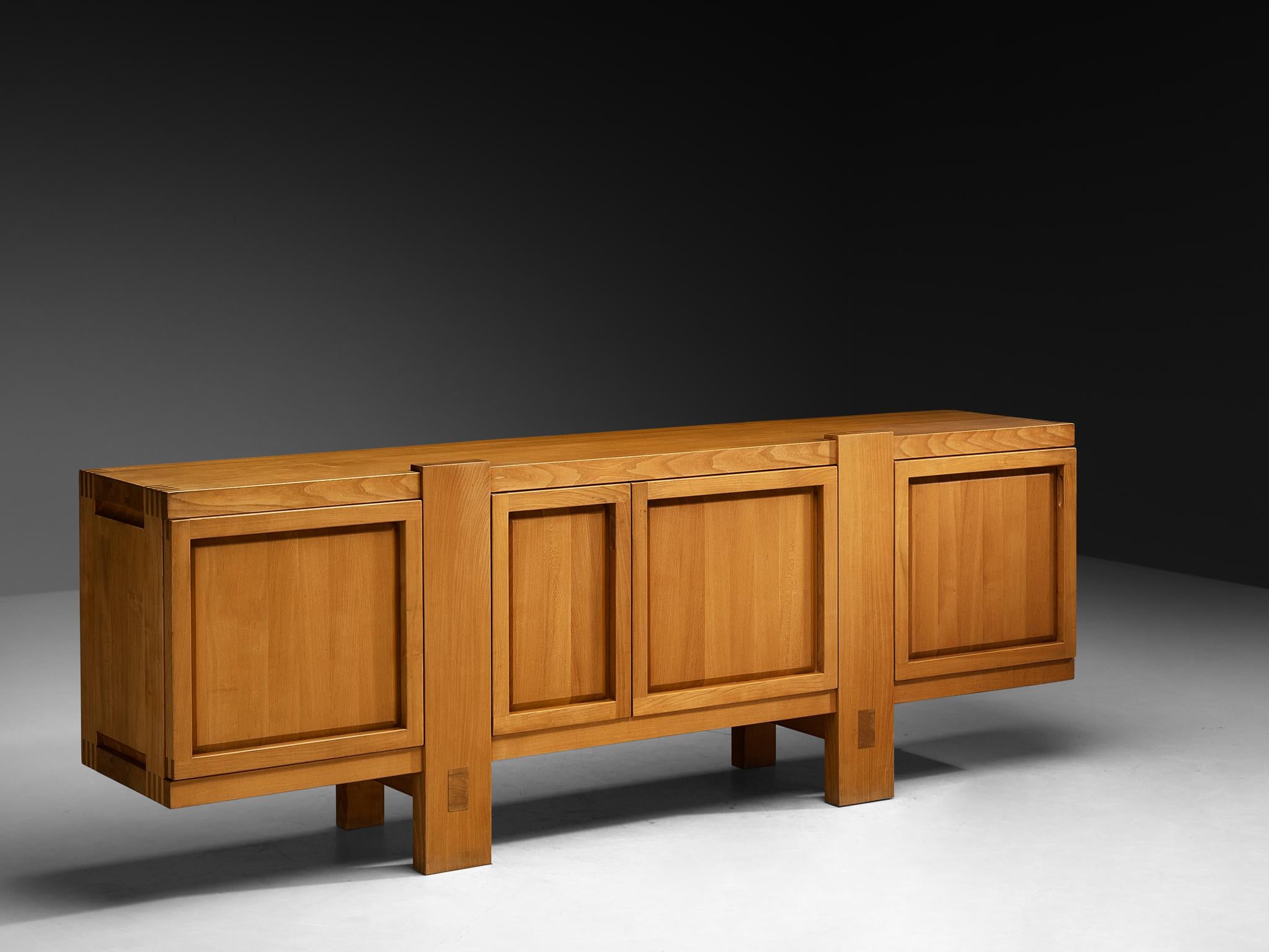 Pierre Chapo, sideboard model 'R16', elm, France, design 1966

This piece is one of the early editions designed by Pierre Chapo, known for his hallmark use of solid elmwood and a commitment to pure and clean design and construction principles. This