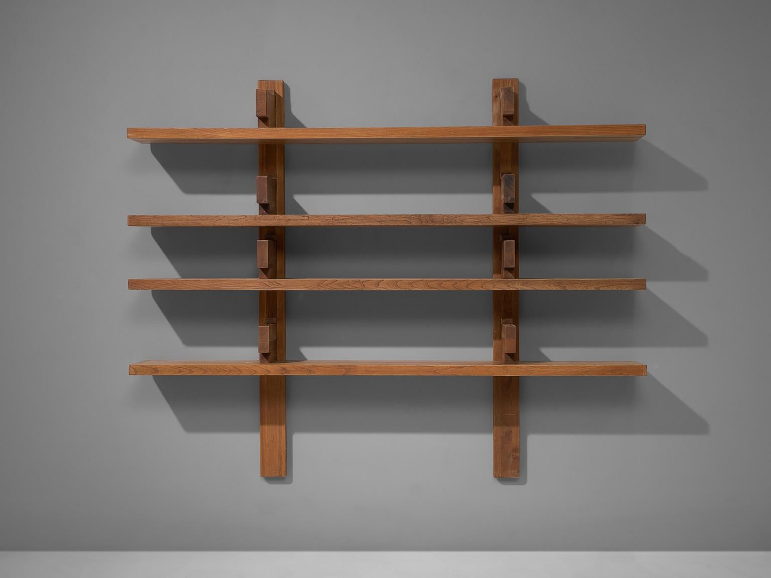 Pierre Chapo, bibliothèque, model no. B17, elm, France, 1960s. 

This is a rare and large model 'B17' - shelves designed by Pierre Chapo. It is the largest version of this quintessential piece by Chapo. The shelving system was created in 1967 were