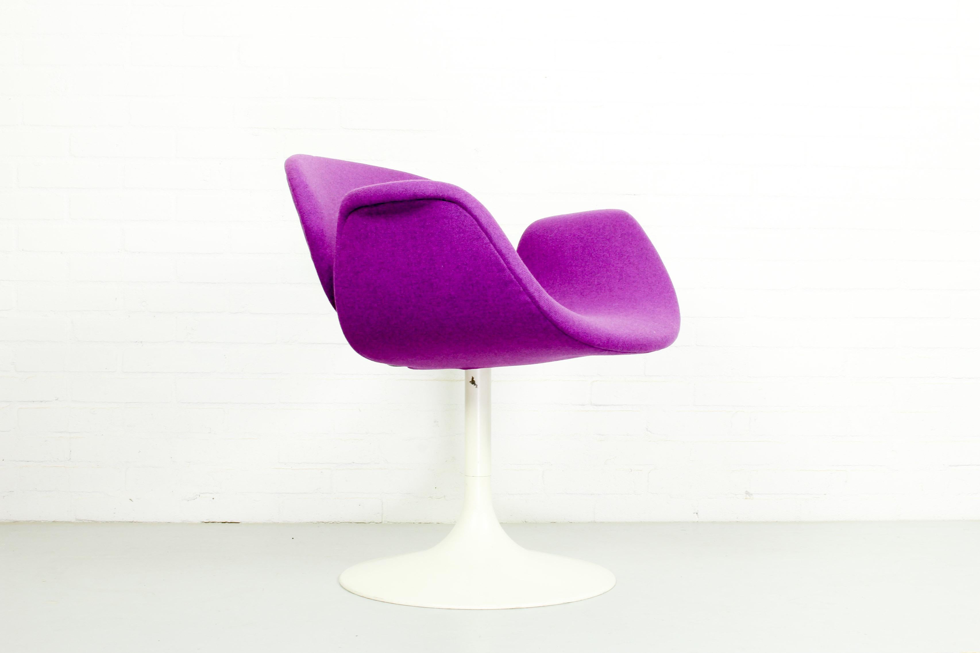 Like all Pierre Paulin’s designs this early little tulip chair is very sculptural. This chair has a very rare early tulip pedestral base. The chair has been newly upholstered with Kvadrat Tonica in a very nice purple color and is ready for another