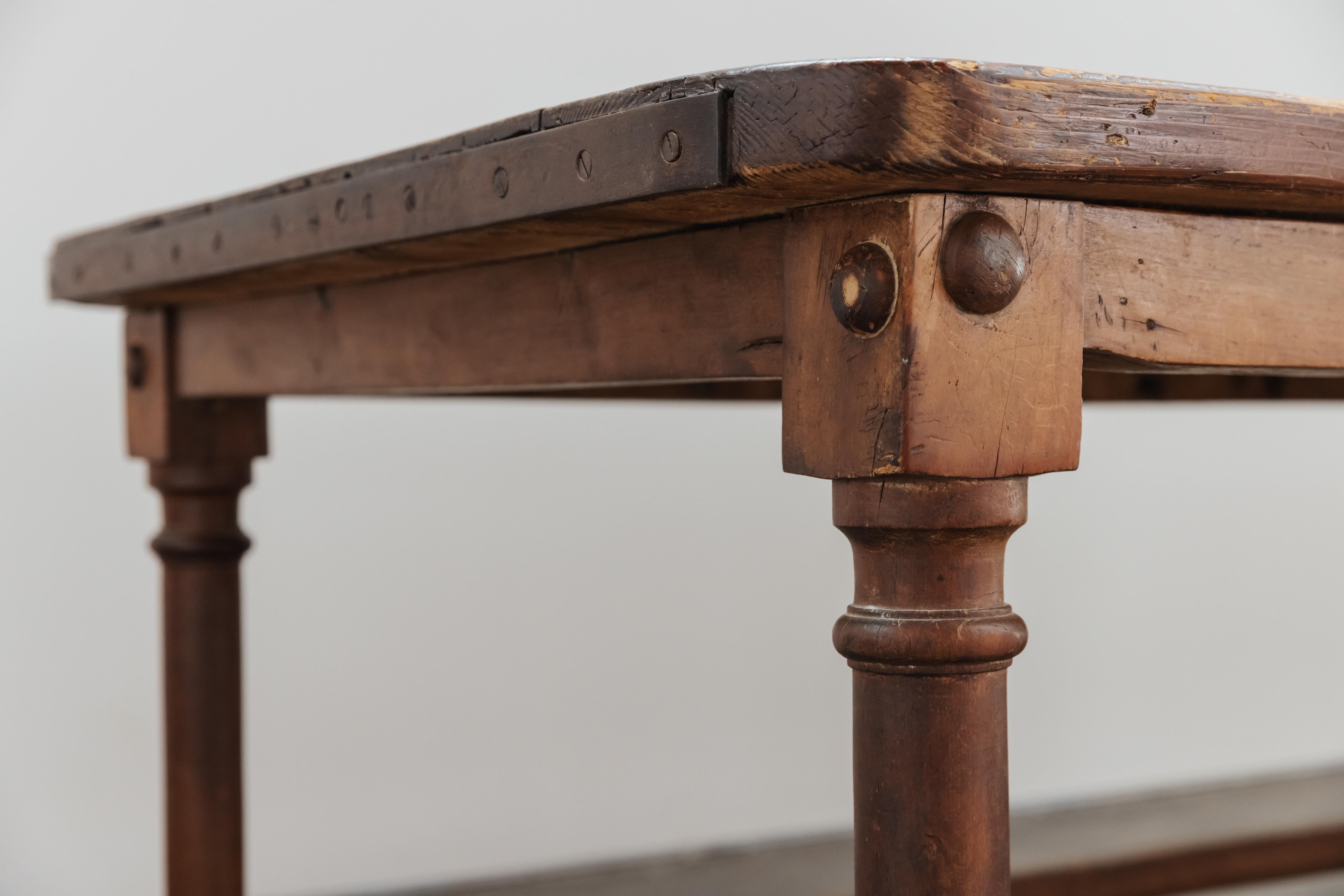 Early Pine Kitchen Prep Table From France, Circa 1900.  Solid pine construction with iron detail.  Nice wear and patina.