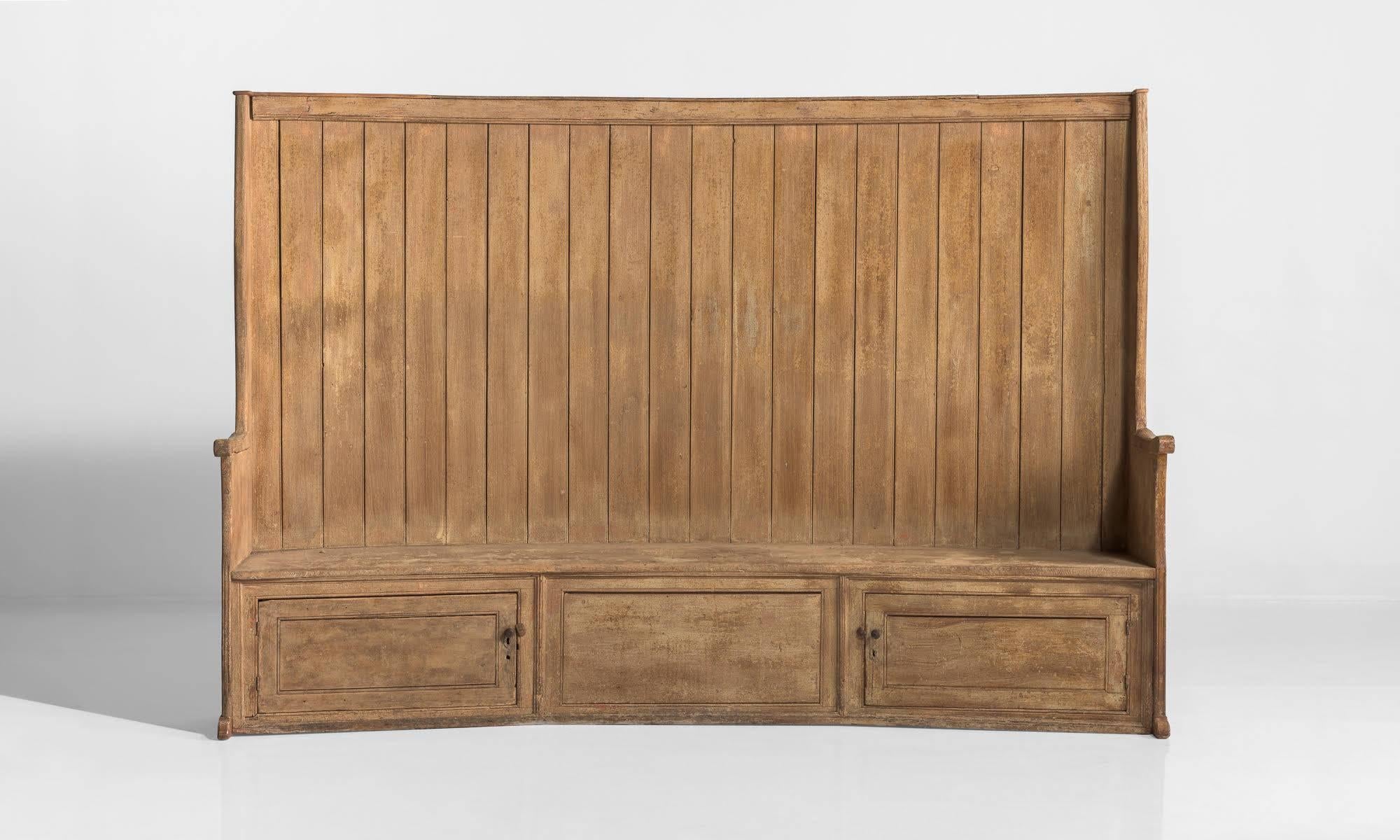 Early pine settle, England, circa 1760

Massive size with storage below seat.

Measures: 109