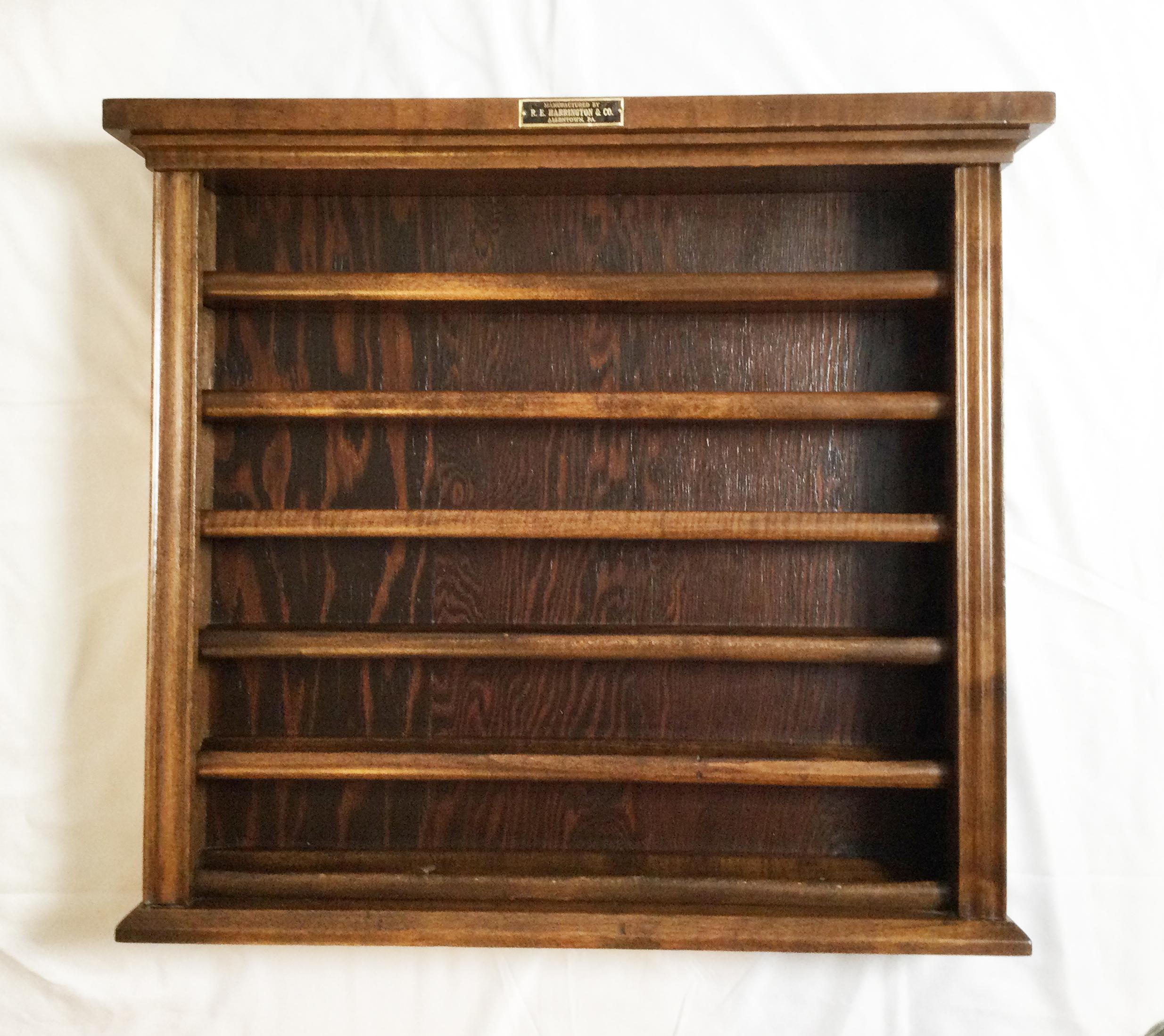 This is a strong, sturdy and wellmade pool ball / billiard ball rack. It is made of wood and has six shelves. The piece was made in Allentown, PA and has its original metal maker’s plaque. This rack shows off six shelves.
 
