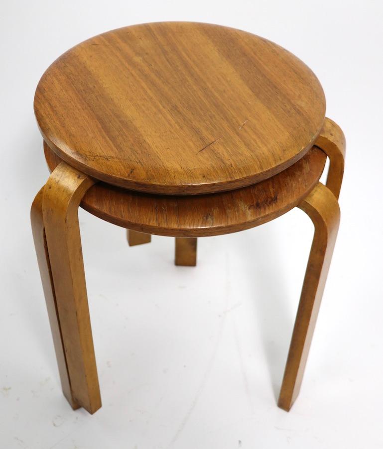 Rare early tables designed by Alvar Aalto, made in Sweden. These tables show cosmetic wear, one top has some lifting of the veneer, at the top, please see images.