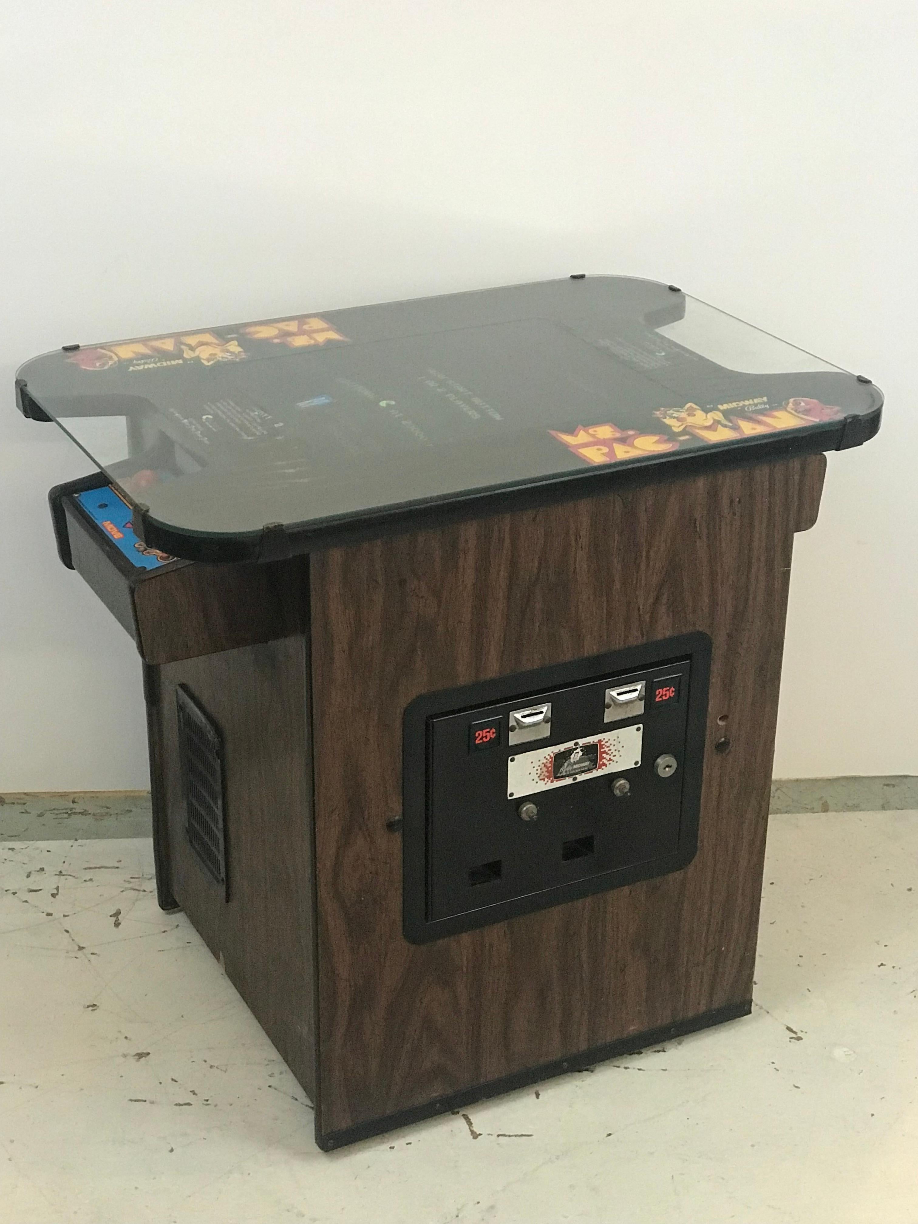 A vintage early issue Ms. Pac-Man cocktail table table game in excellent working order with highly popular aftermarket 