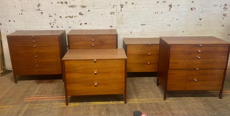 Classic architectural design. Early production dresser or chest of drawers designed by Florence Knoll for Knoll International.Retains original KNOLL label.

Beautiful walnut grain throughout. Retains the original stainless drawer pulls. Three