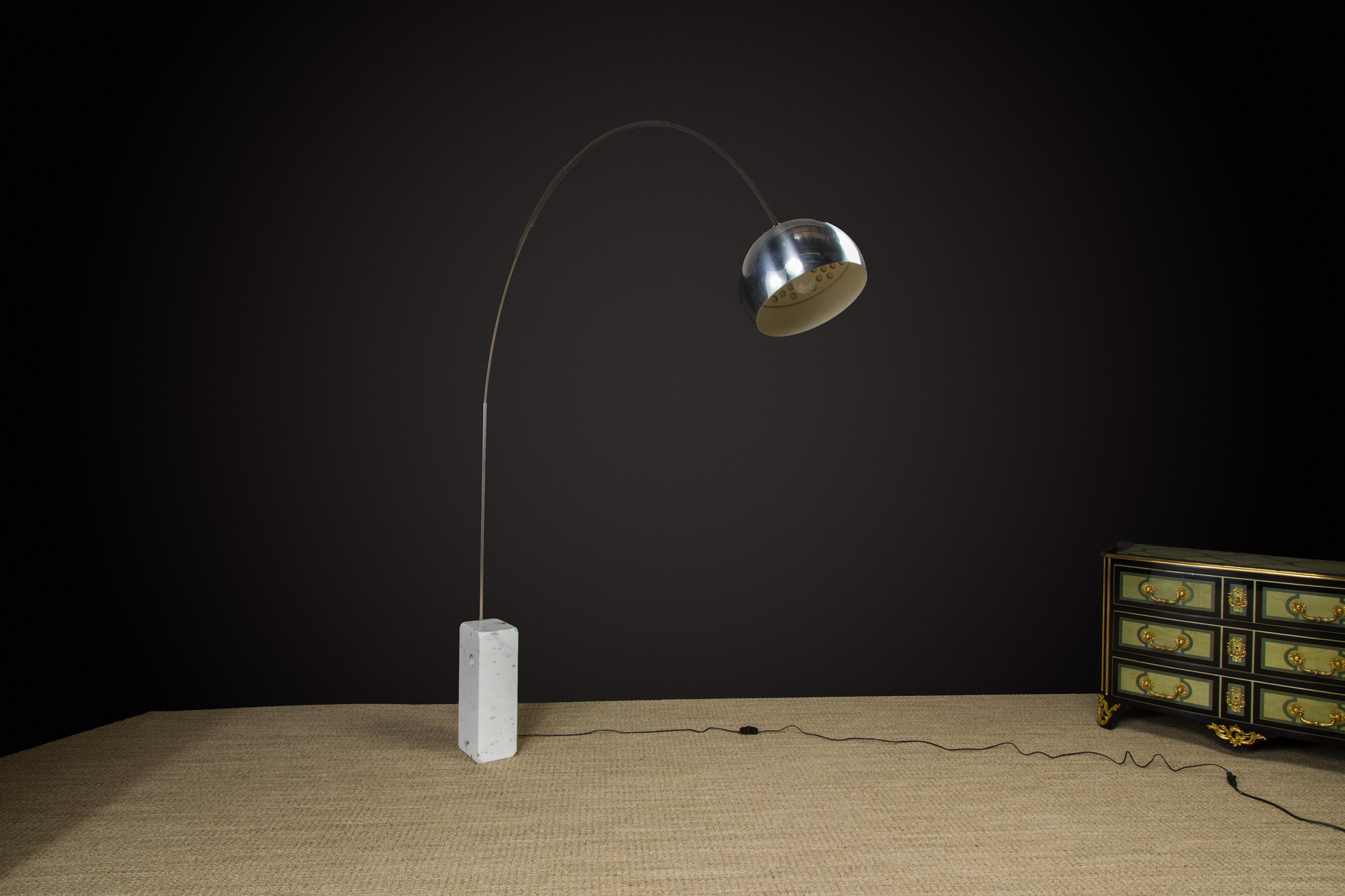 A beautiful early production and signed 'Arco' adjustable floor lamp by the Castiglioni brothers (Achille & Pier Giacomo Castiglioni) for Flos, Italy. Designed in 1962, this early production example produced circa 1970s.  Signed on both the inside