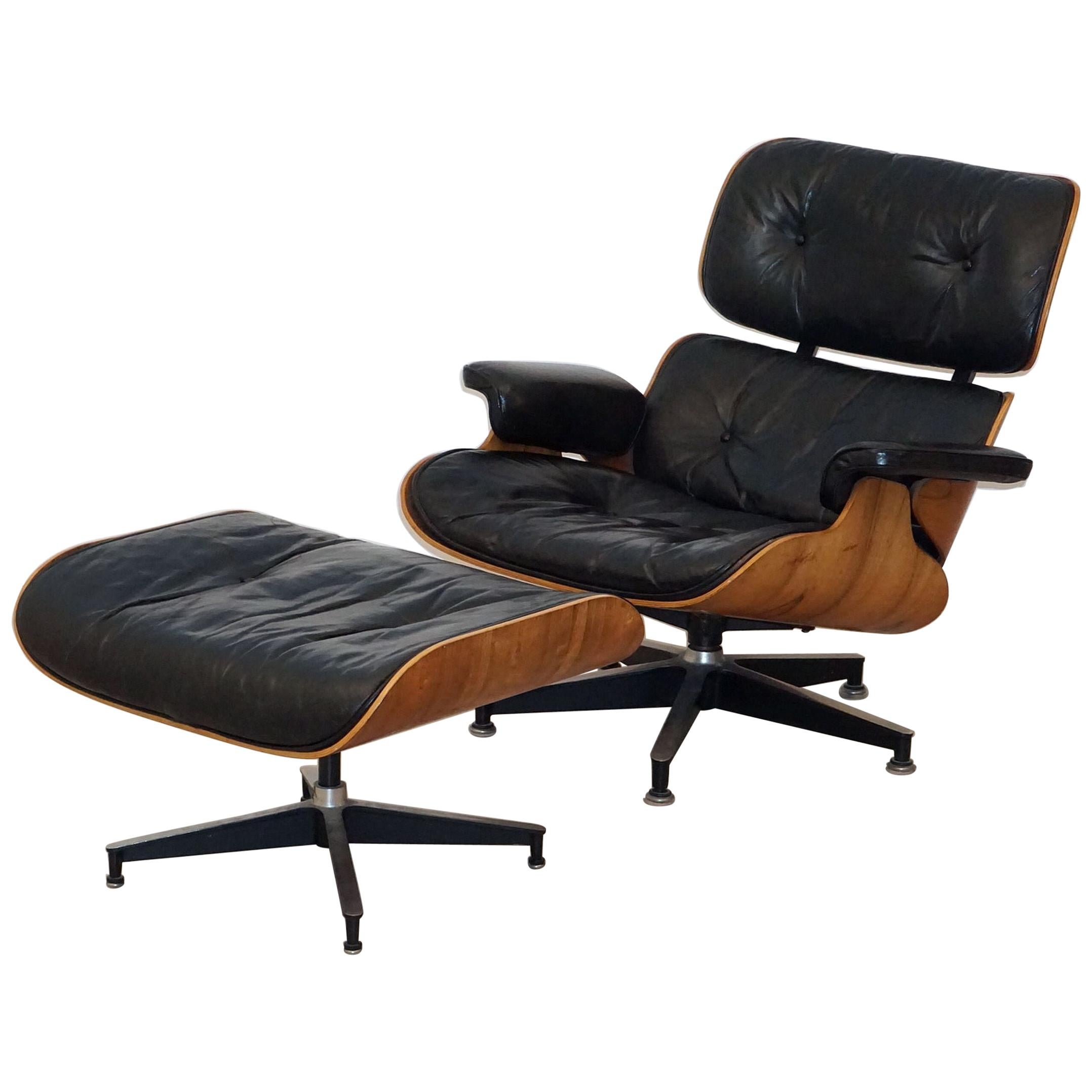 Early Production Charles and Ray Eames Rosewood Lounge Chair with Ottoman