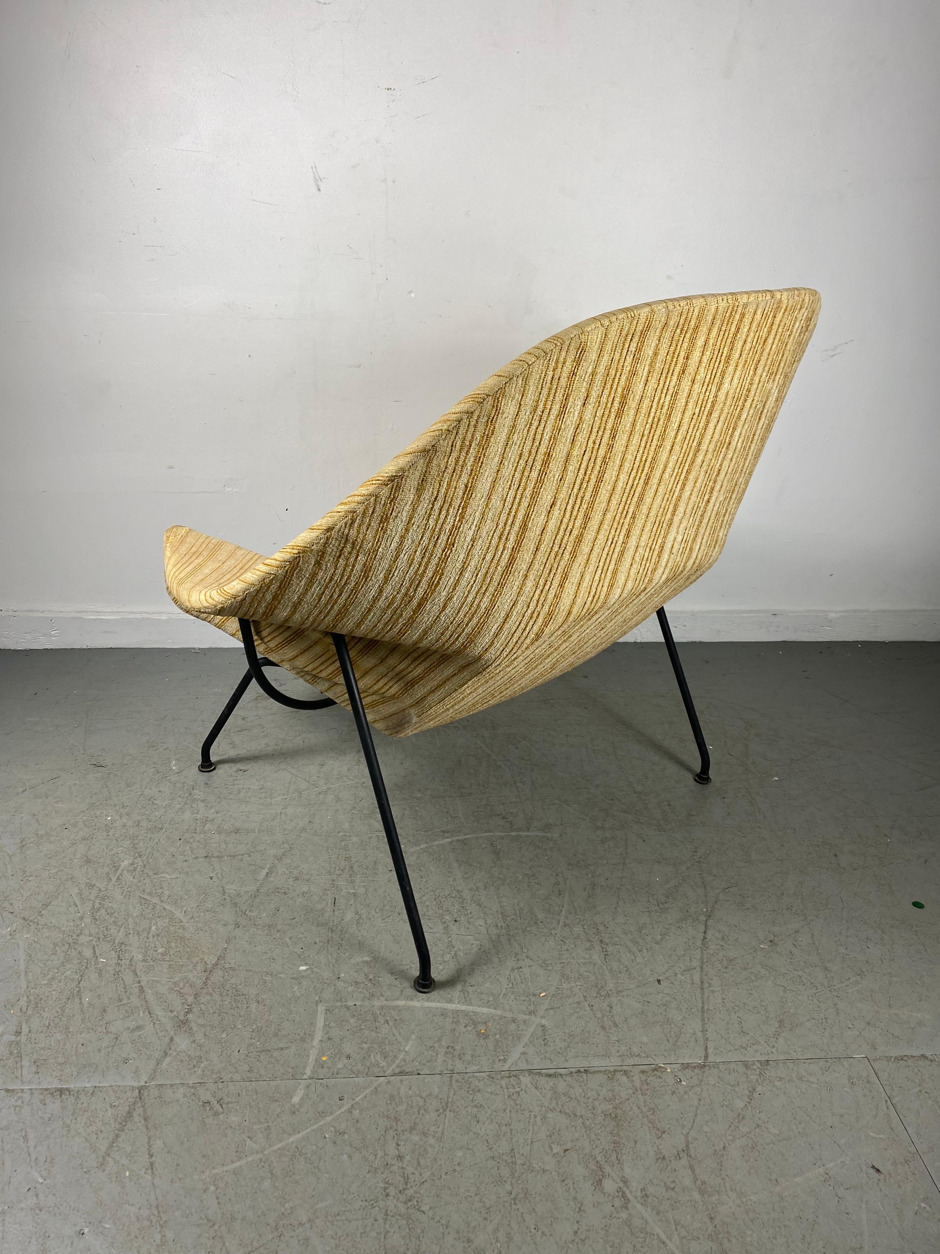 yellow womb chair