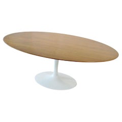 Early production Eero Saarinen Knoll  walnut Tulip group dining table
