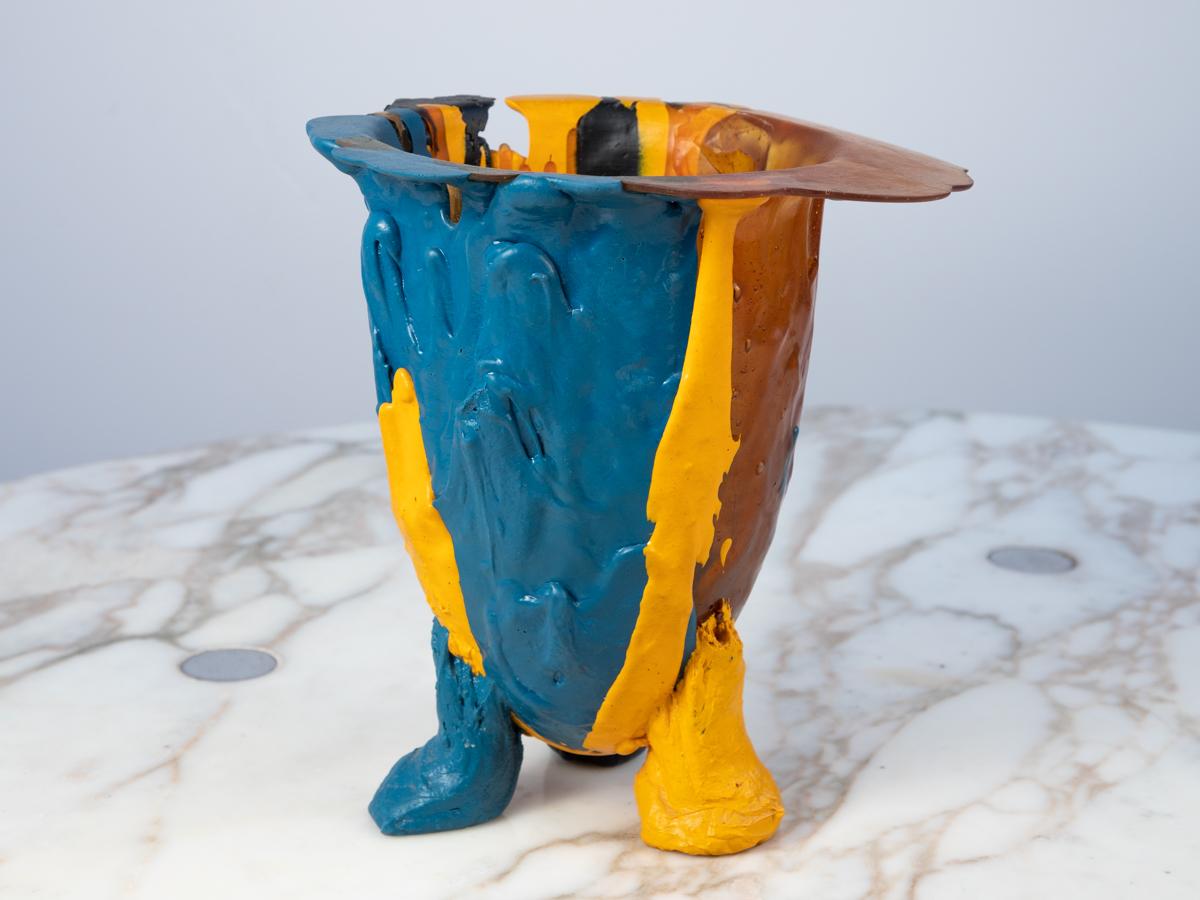 First edition Amazonia Vase, designed by Gaetano Pesce for Fish Design. Exuberant form with an anthropomorphic quality. Molded in the designer's signature polychrome soft resin material in bright yellow, blue and amber with a translucent quality.