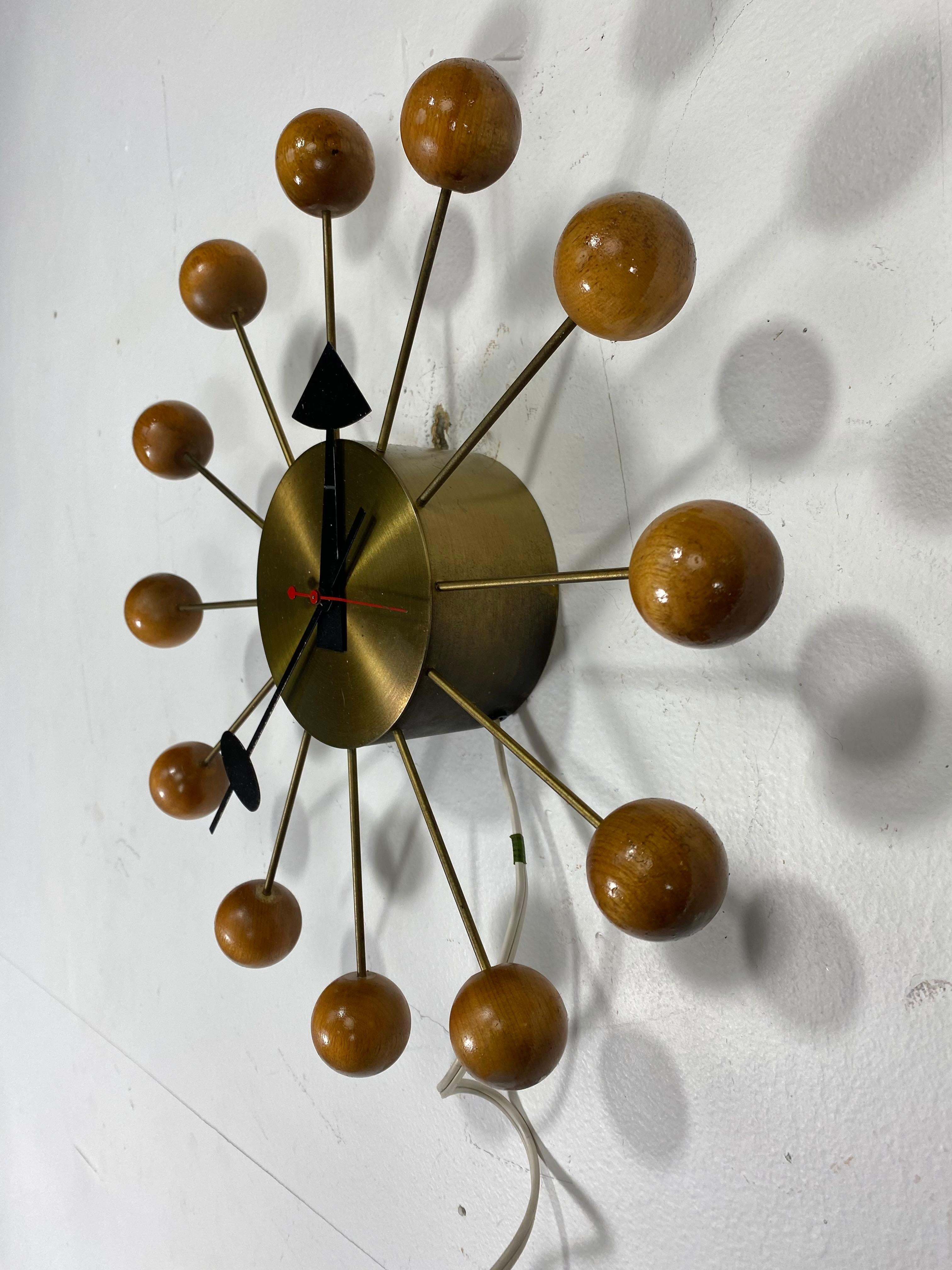 howard miller starburst clock