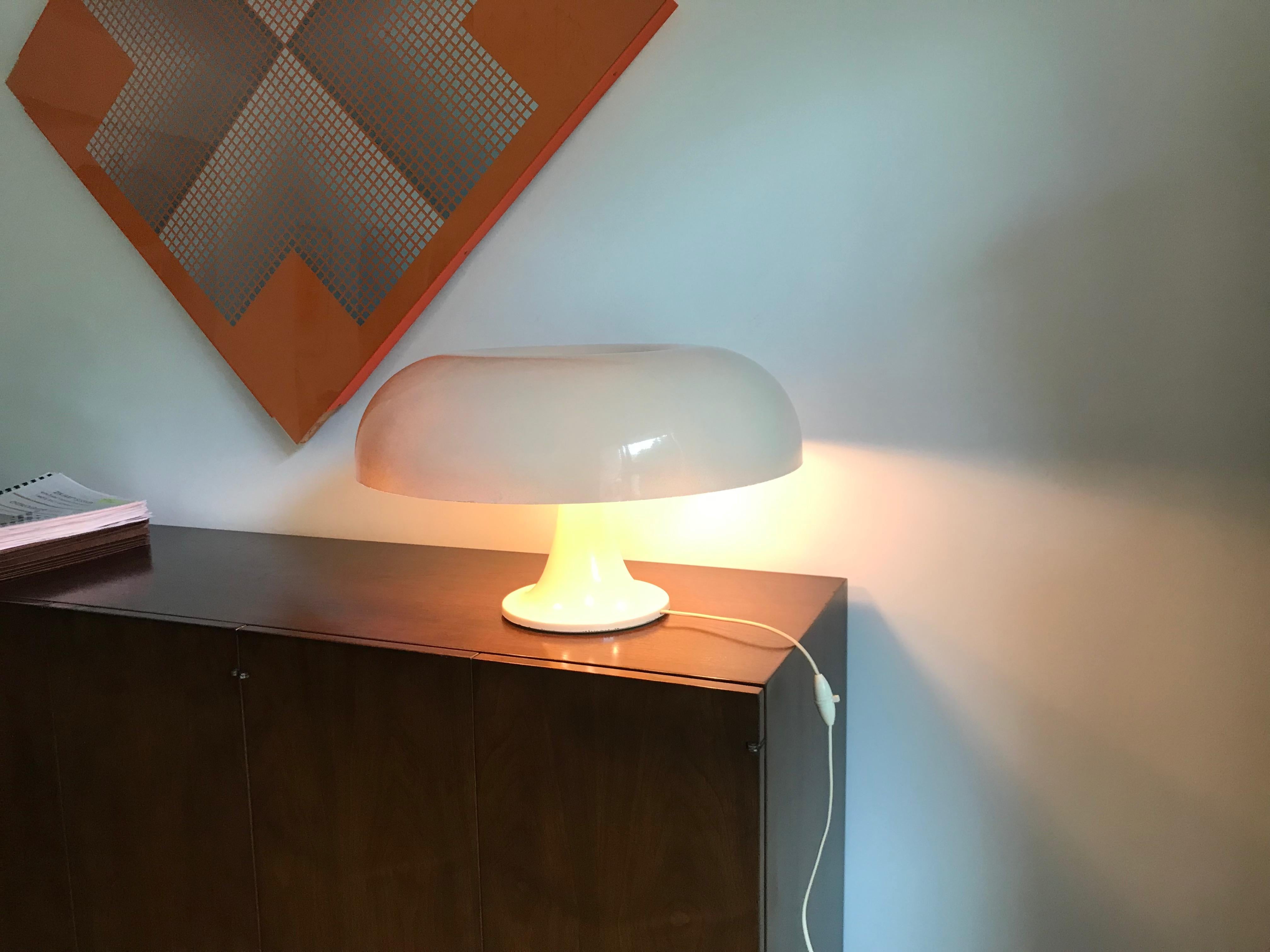 A classic pop mod design.
If you like original early modern design pieces? Then this lamp is for you. 
This is an early hand laminated limited production fiberglass shade.
It does not have the branded logo on the bottom. That was added in later and