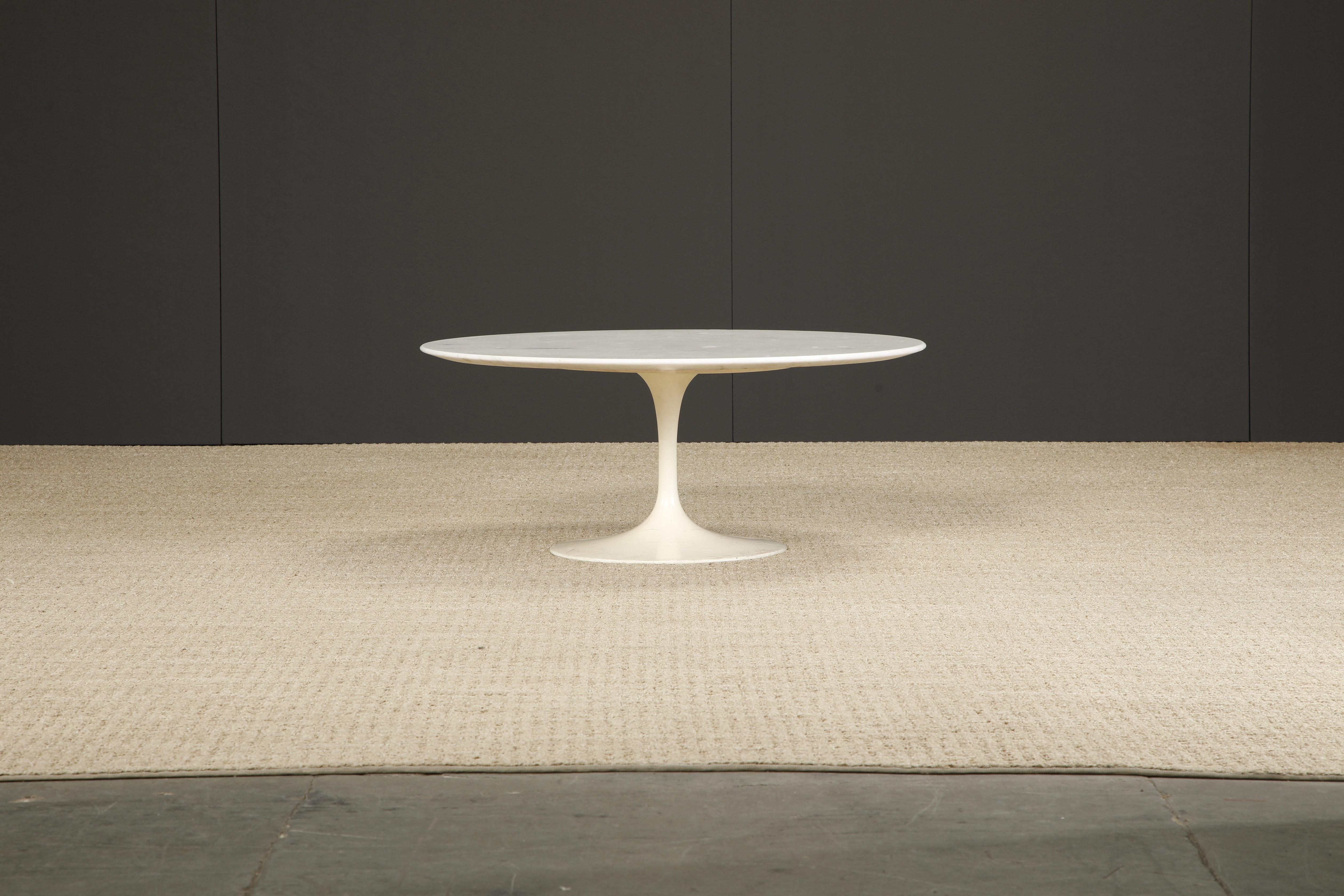 This sought-after collectors piece is an all-original early year (1st Generation) production example of the 'Tulip' coffee table designed in 1956 by Eero Saarinen for Knoll Associates features a 36