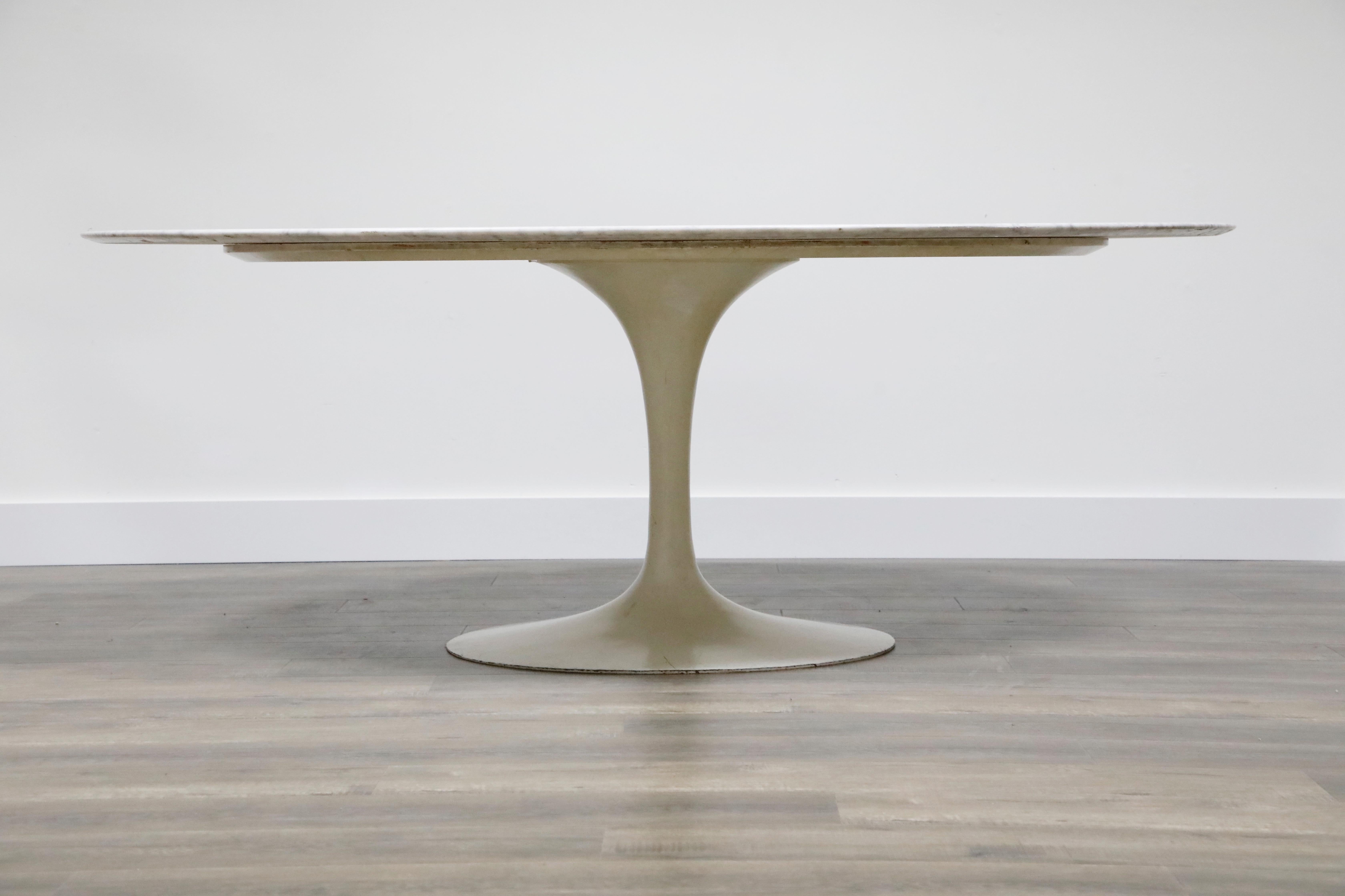 Often considered by designers and collectors as the pièce de résistance of marble dining tables, this 2nd Generation early production year of 1969, Knoll International (signed and date stamped 1969) white marble 'Tulip' dining table is one of the