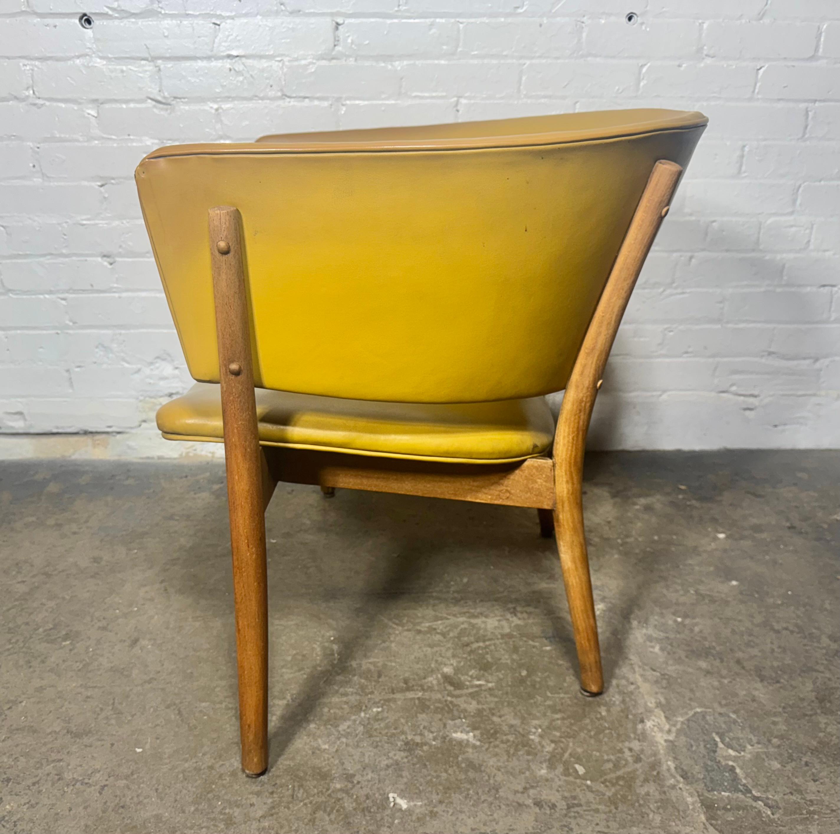   Classic Nana Ditzel design lounge chair model ND83, Denmark. First production edition manufactured by Søren Willadsen in oak with it's original faux leather upholstery, eXTREMELY COMFORTABLE. Amazing period color.. Minor flaws to upholstery (see