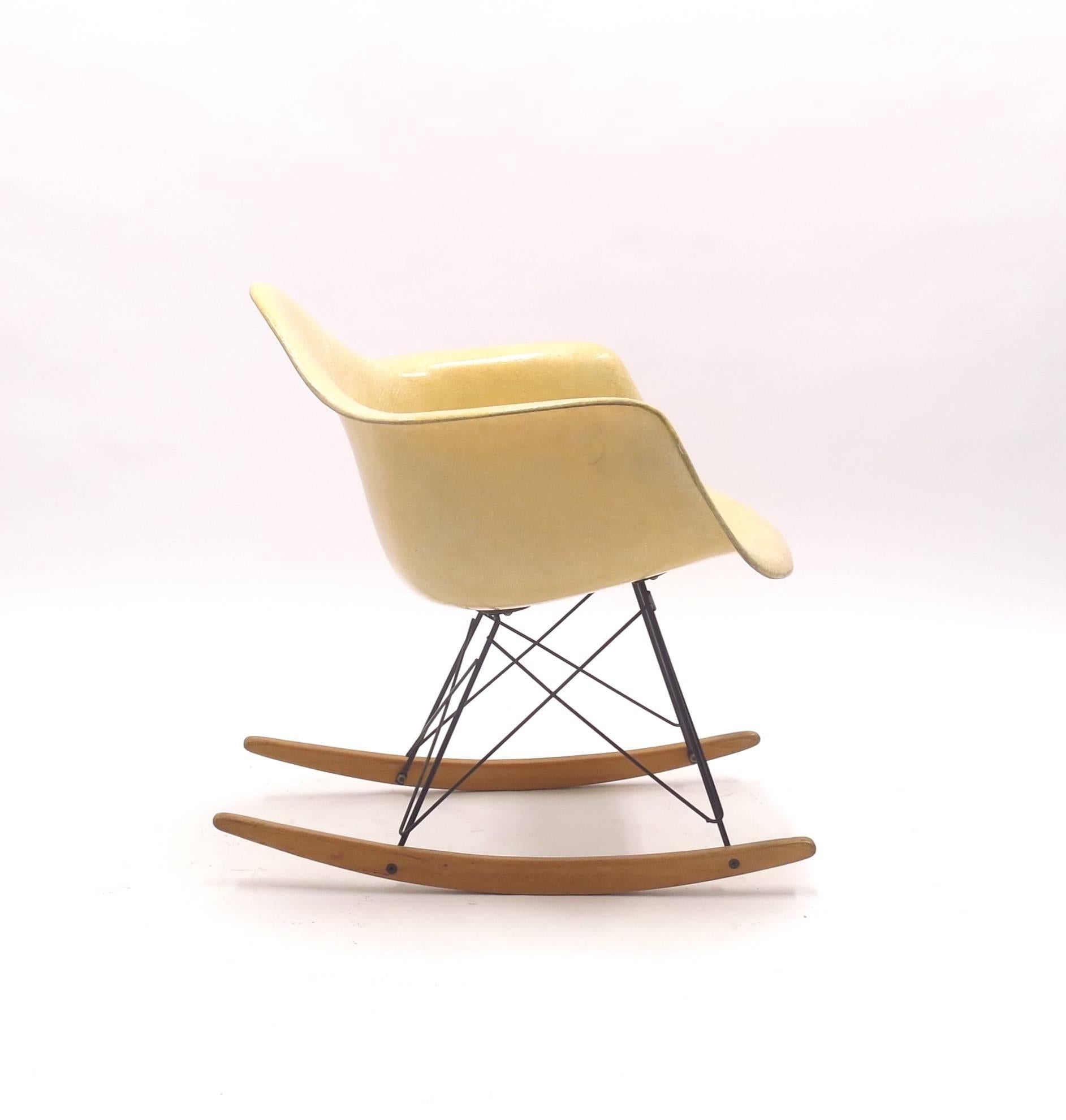 The RAR (Rocking Armchair on Rods) rocker was designed by Charles & Ray Eames for Herman Miller in the United States in the 1950s. This early edition was made by Zenith for Herman Miller and features rope edge and that thin almost see trough