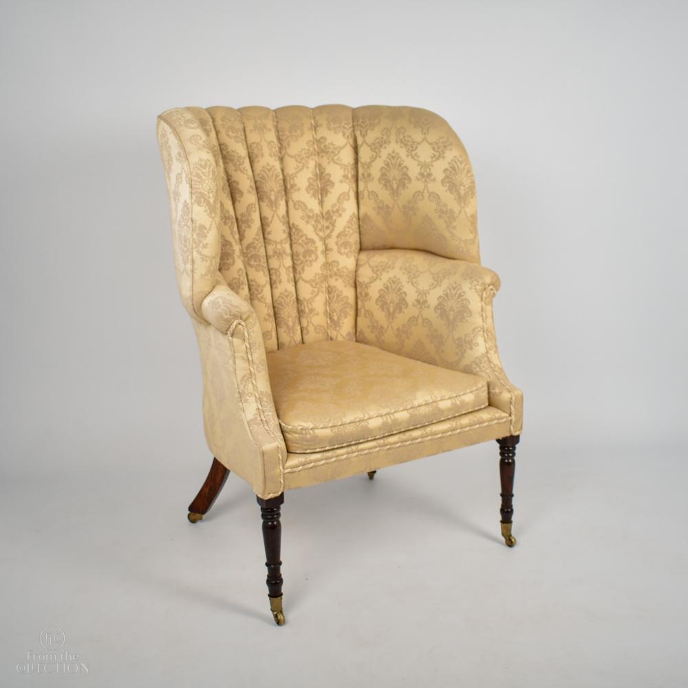 A pair of rare early Queen Anne curved back chairs on exquisite turned mahogany legs with original castors. Circa 1715. Currently upholstered in a later 20th century lemon damask fabric. It is exceptionally hard to find a pair of Queen Anne chairs