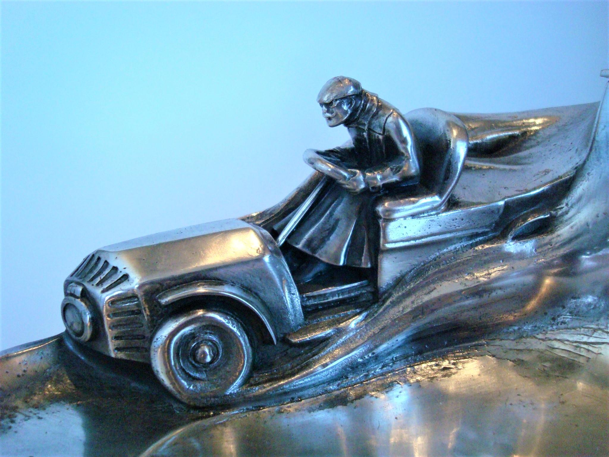 Inkwell of an Automobile and Driver, ca. 1905-1915 Automobilia
Silvered Pewter racing car inkwell and pentray
Early race car inkwell sculpture of a Vanderbilt cup race era.
Racing car desk piece, silver plate on pewter.
A wonderful
