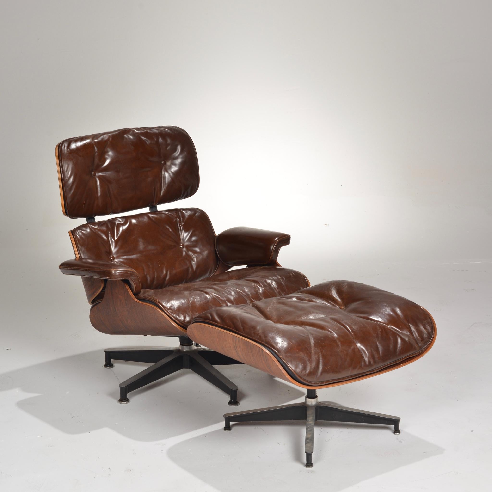 First generation Ray & Charles Eames for Herman Miller 670 lounge chair and 671 ottoman in rosewood and tufted brown leather. This piece has been refinished and reupholstered and is in excellent condition. Marked on the underside with silver Herman