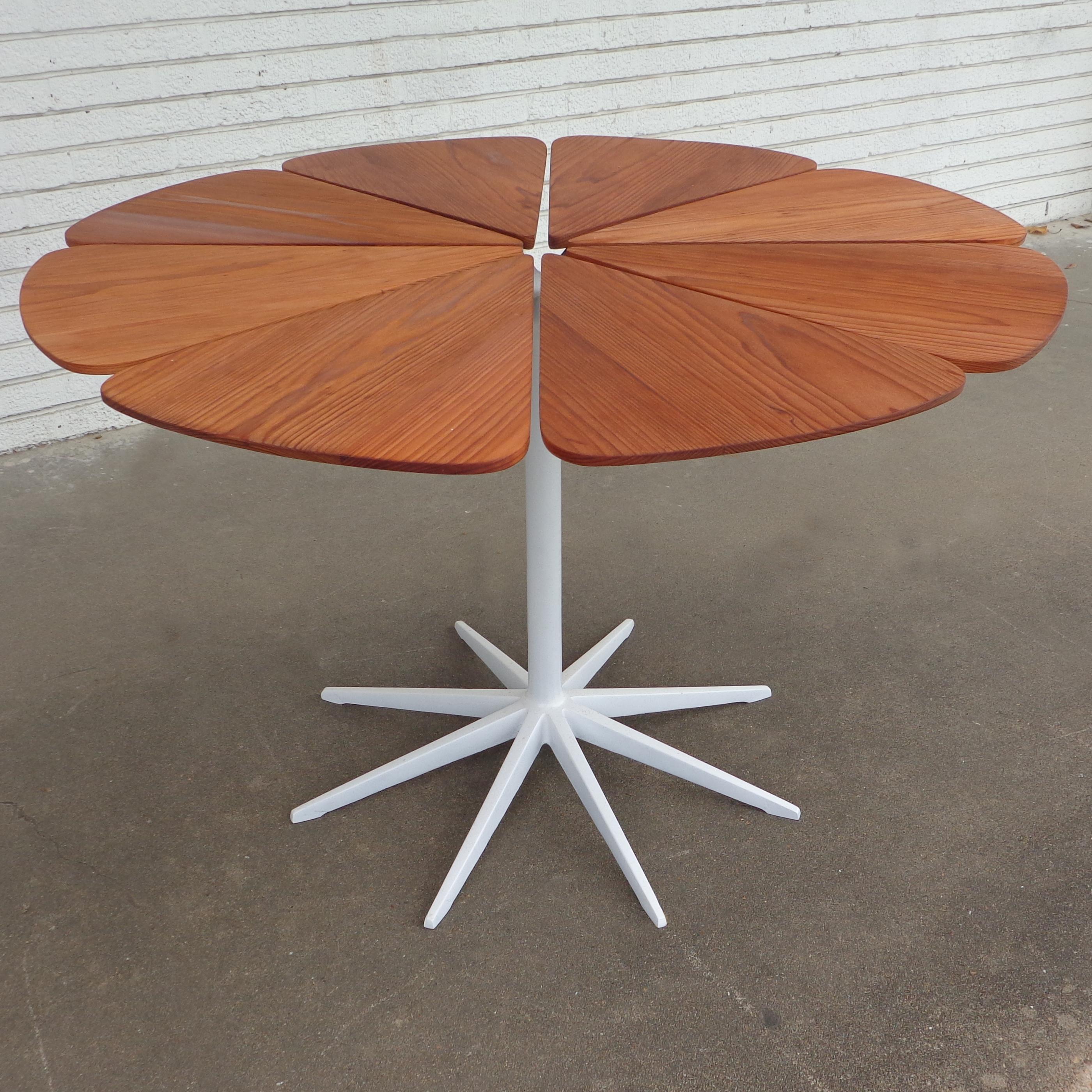 Early Richard Schultz 42 inch Redwood Petal Dining Table

Restored Rare Richard Schultz Petal Dining Table, circa 1960s. Branch-like base supports the eight individual redwood petals that make up the tables surface.   Weather resistant redwood makes